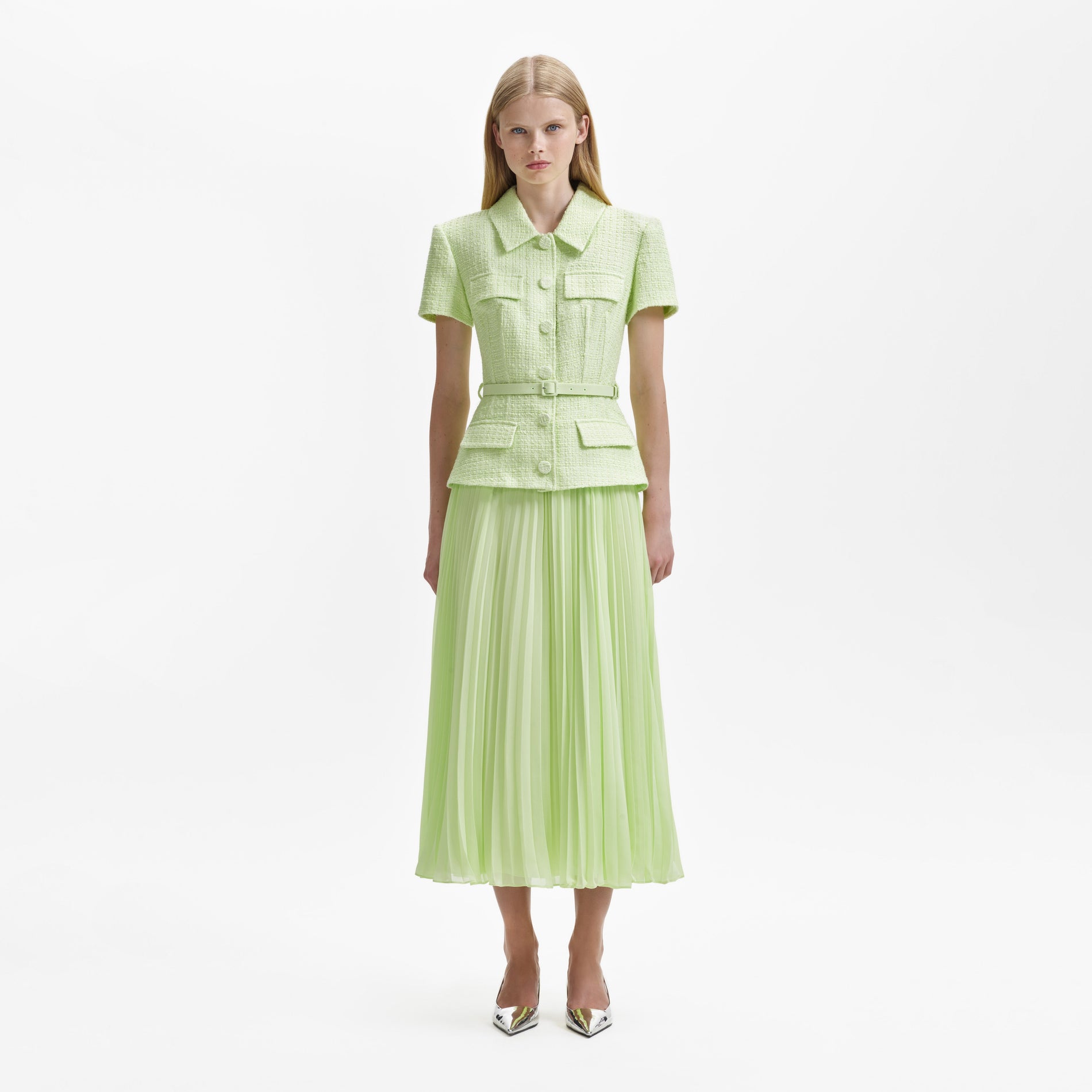 A woman wearing the Lime Boucle Collared Chiffon Midi Dress