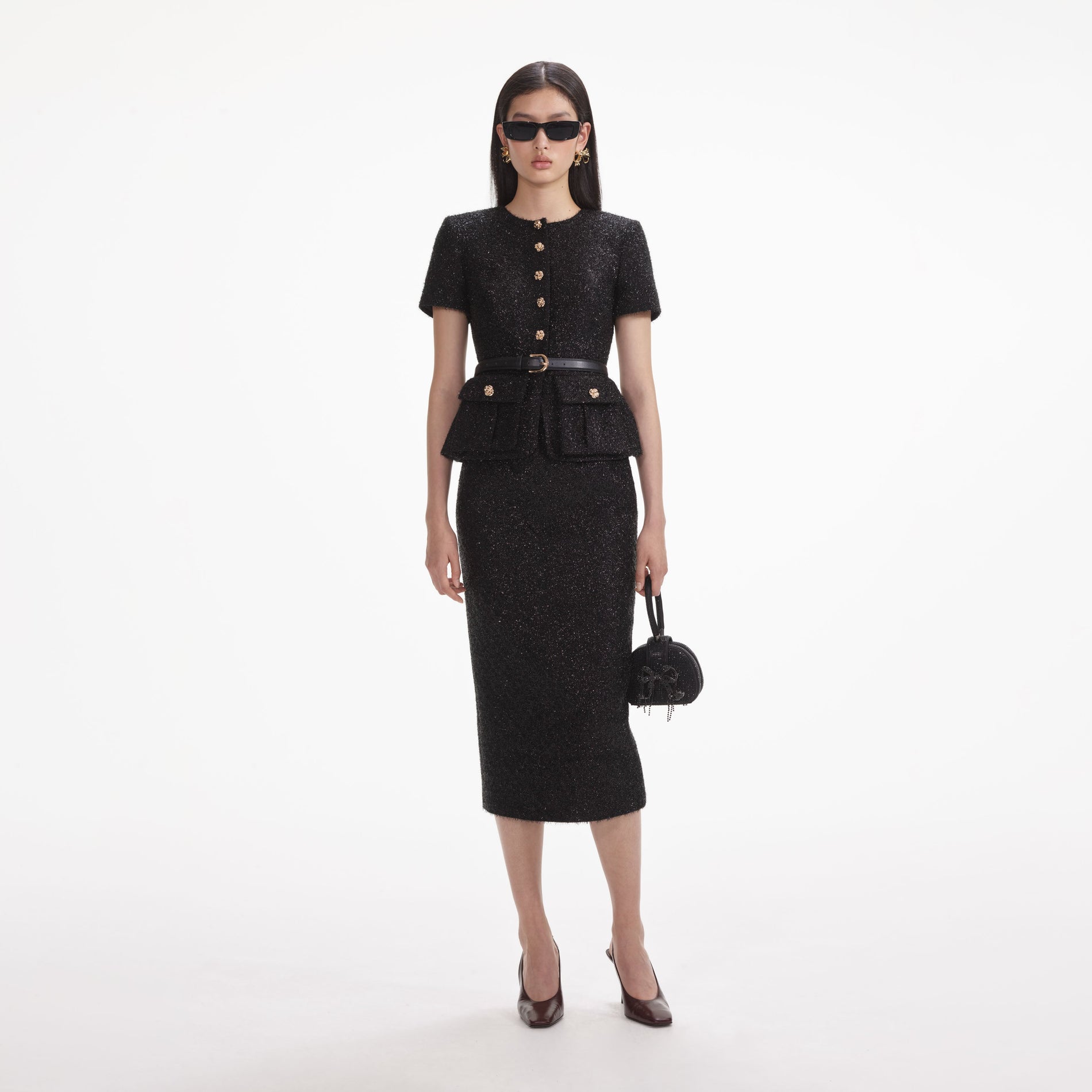 Front view of a woman wearing the Black Tinsel Boucle Tailored Midi Dress