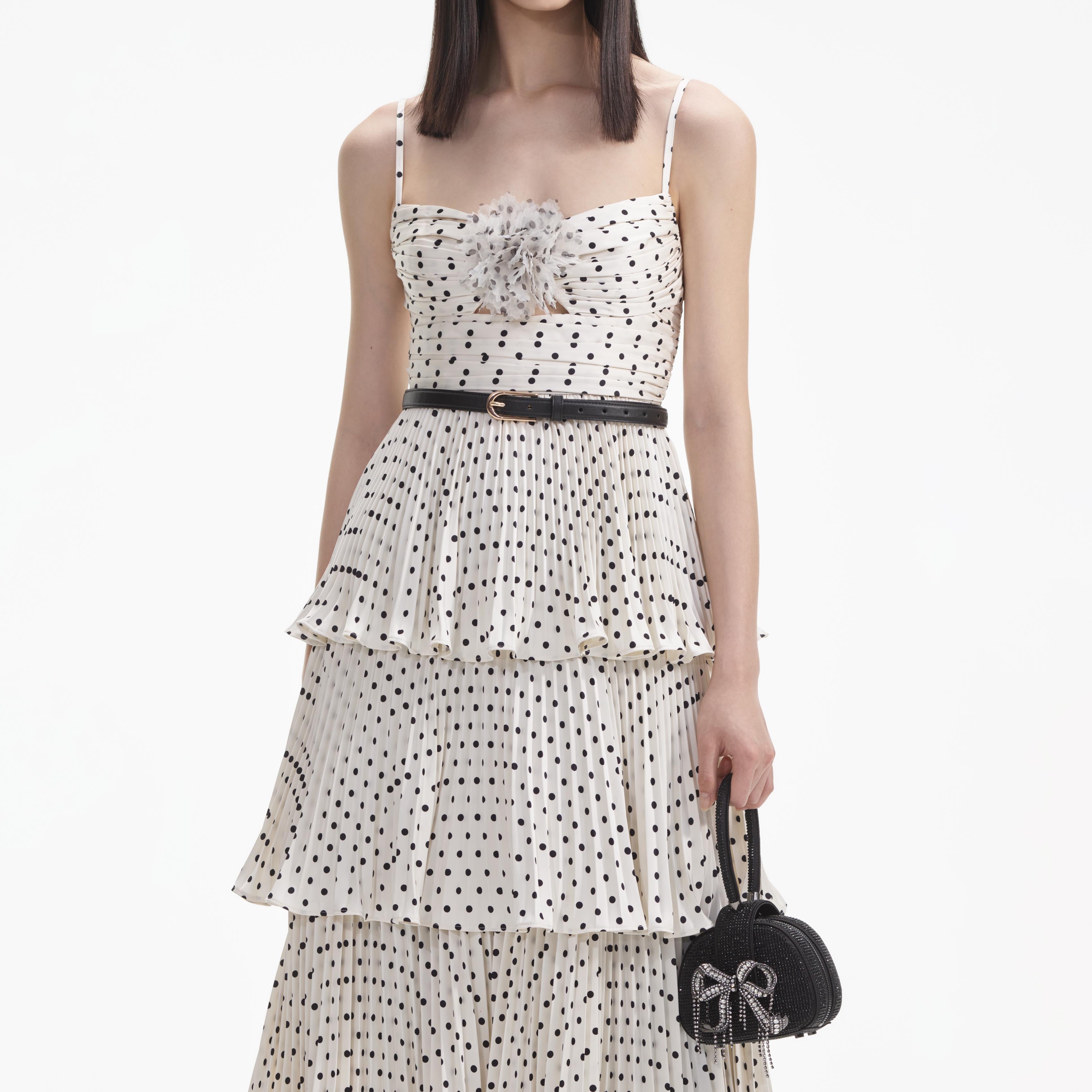 Cream shops and black polka dot dress