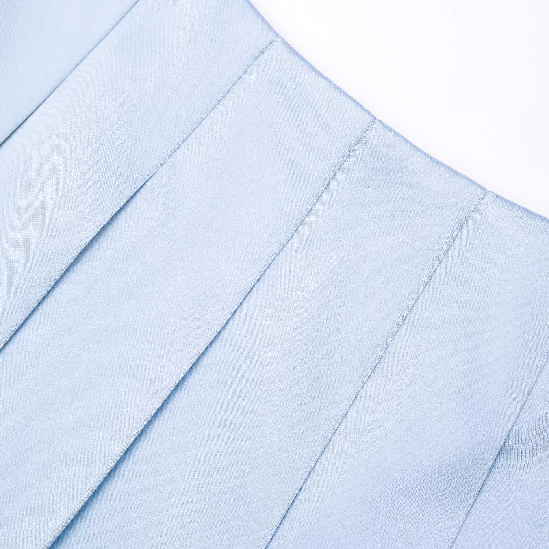 A close up of the fabric for the Blue Satin Midi Skirt