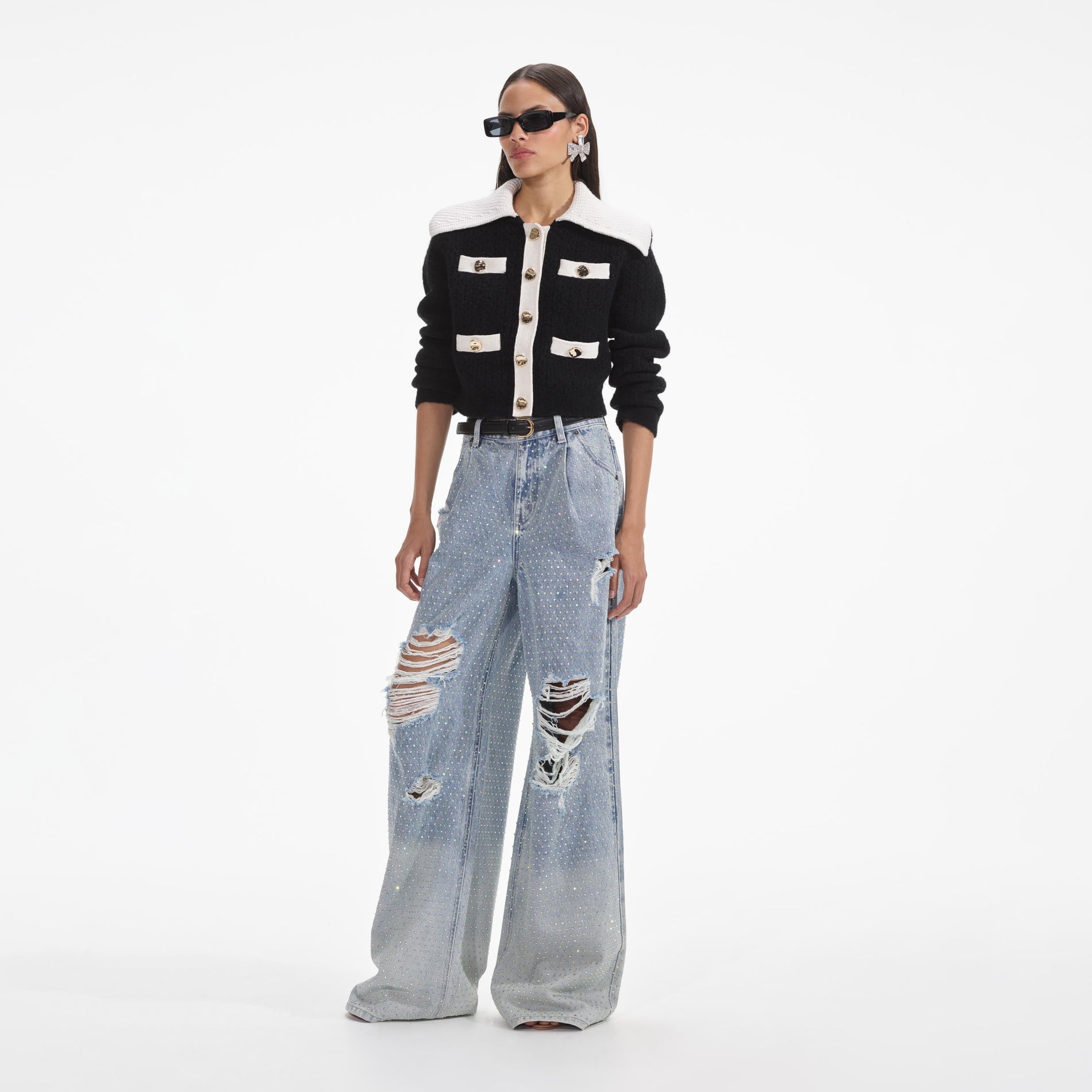 Side view of a woman wearing the Black Cashmere Blend Cardigan