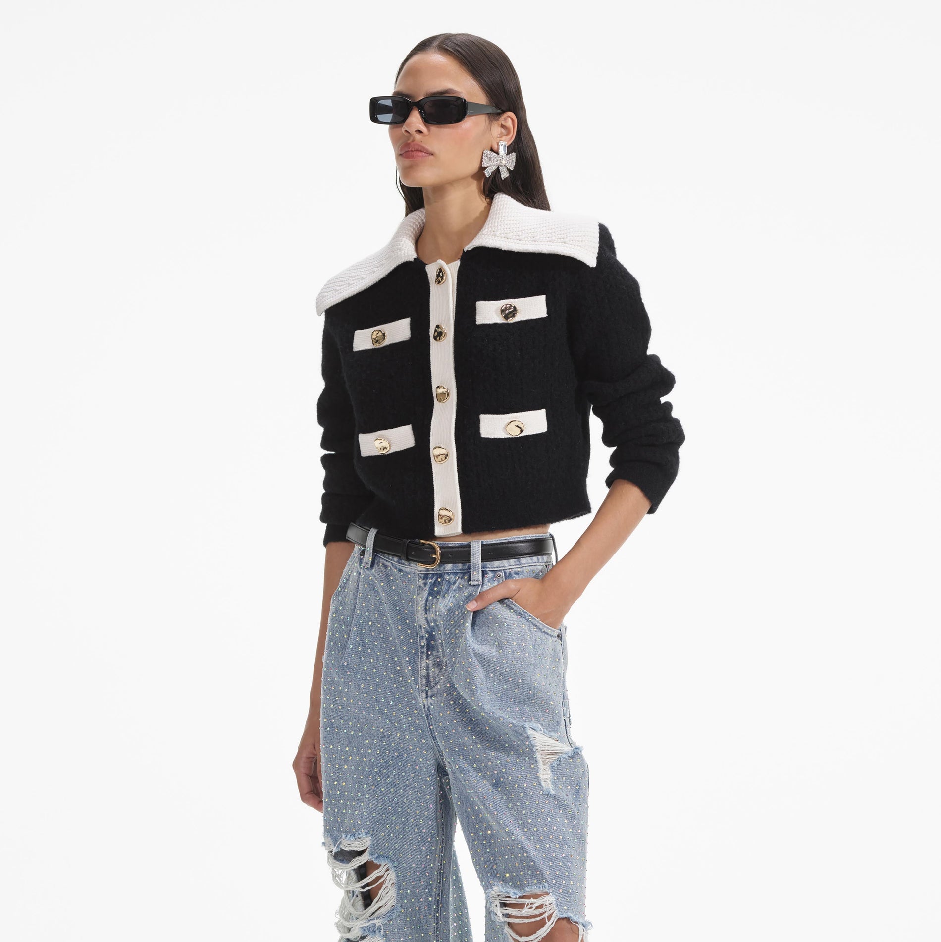 A close up of a woman wearing the Black Cashmere Blend Cardigan