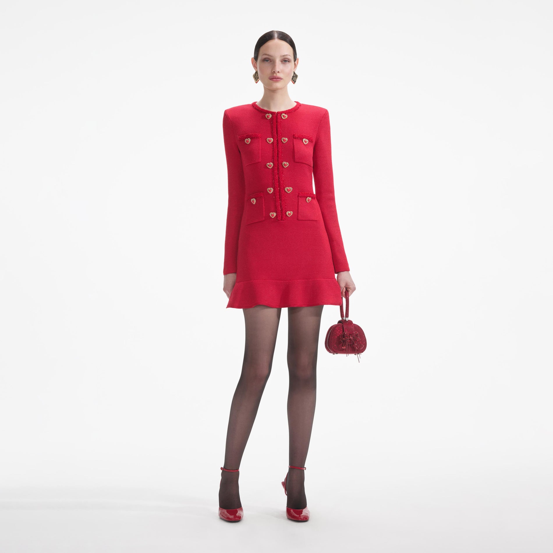 Front view of a woman wearing the Red Knit Heart Buttoned Mini Dress