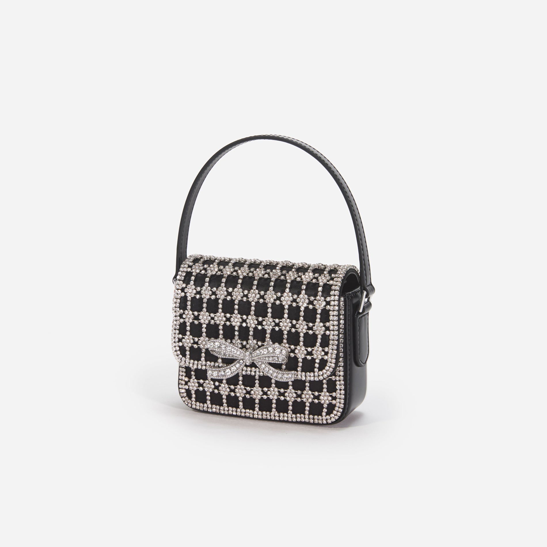 Side view of a woman wearing the Black Crystal Micro Bag