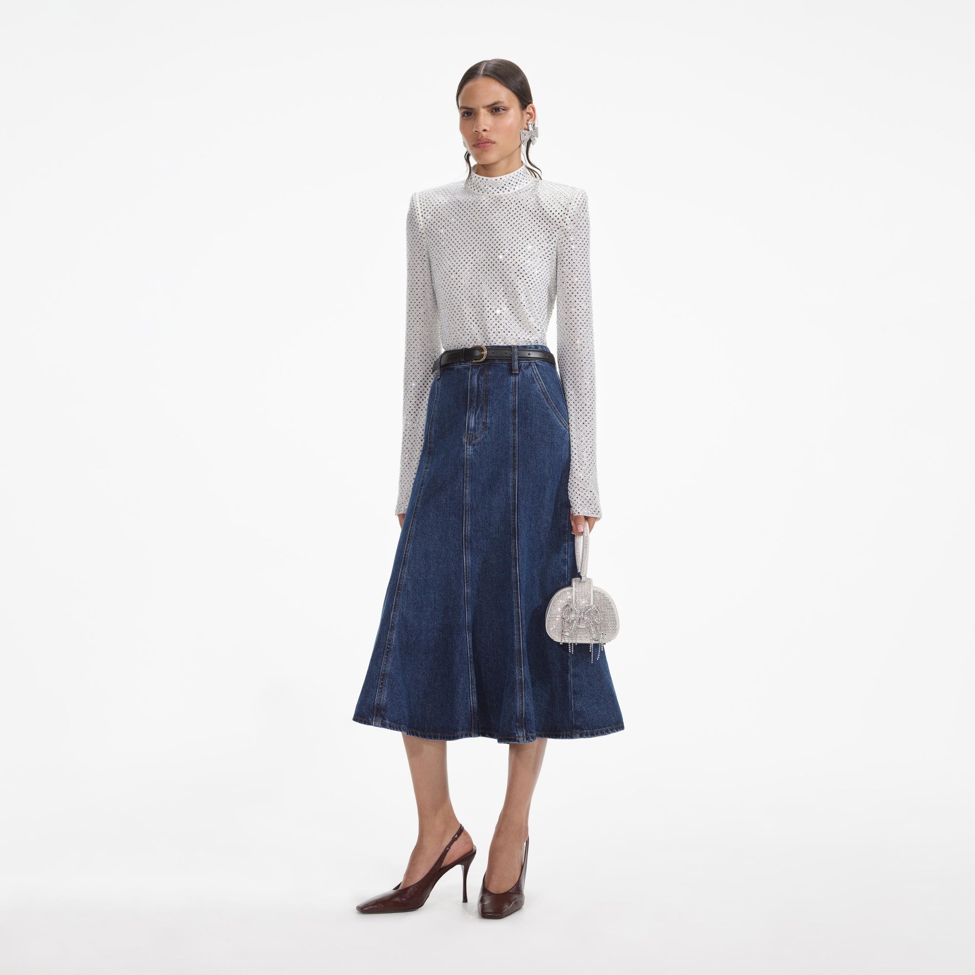 A close up of the fabric for the Silver Rhinestone Top Handle Clutch Bag