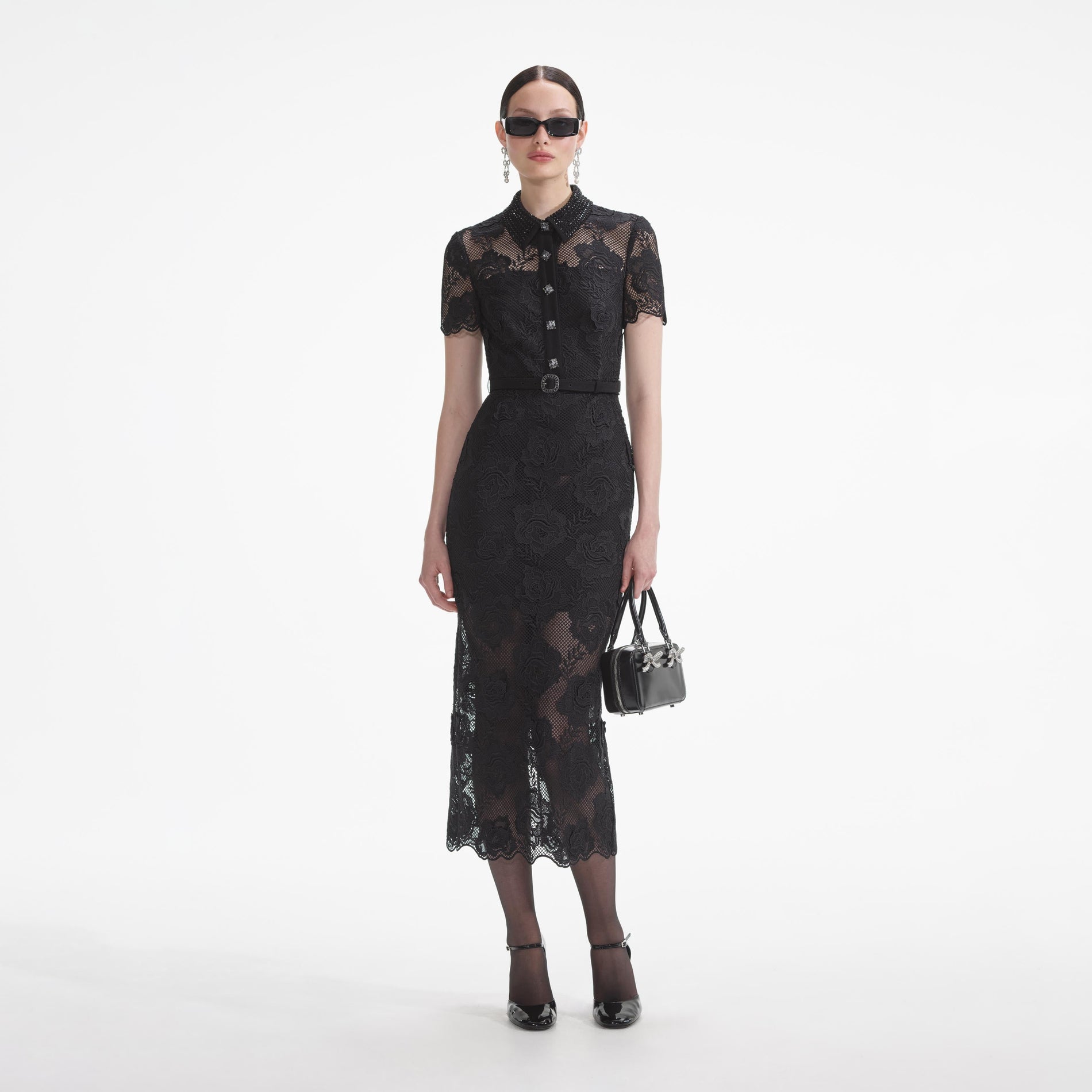 Front view of a woman wearing the Black Lace Diamante Midi Dress