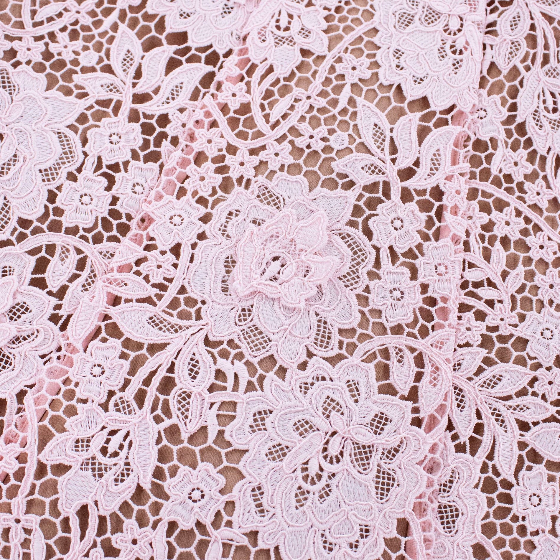 A close up of the fabric for the Pink Flower Lace Midi Dress