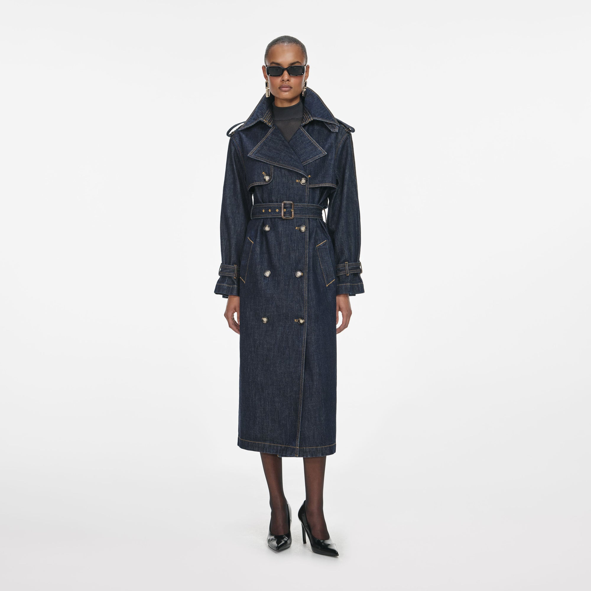 Front view of a woman wearing the Indigo Denim Trench Coat