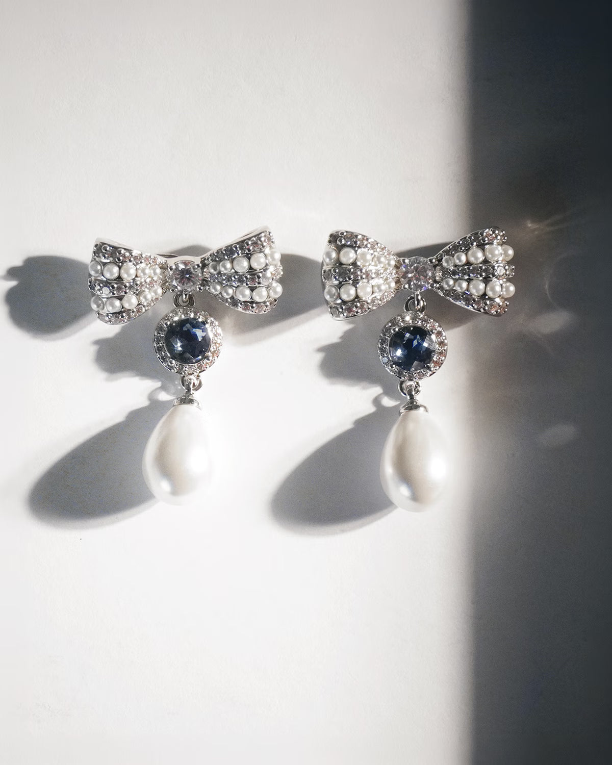 Silver Crystal Bow Blue Droplet Earrings