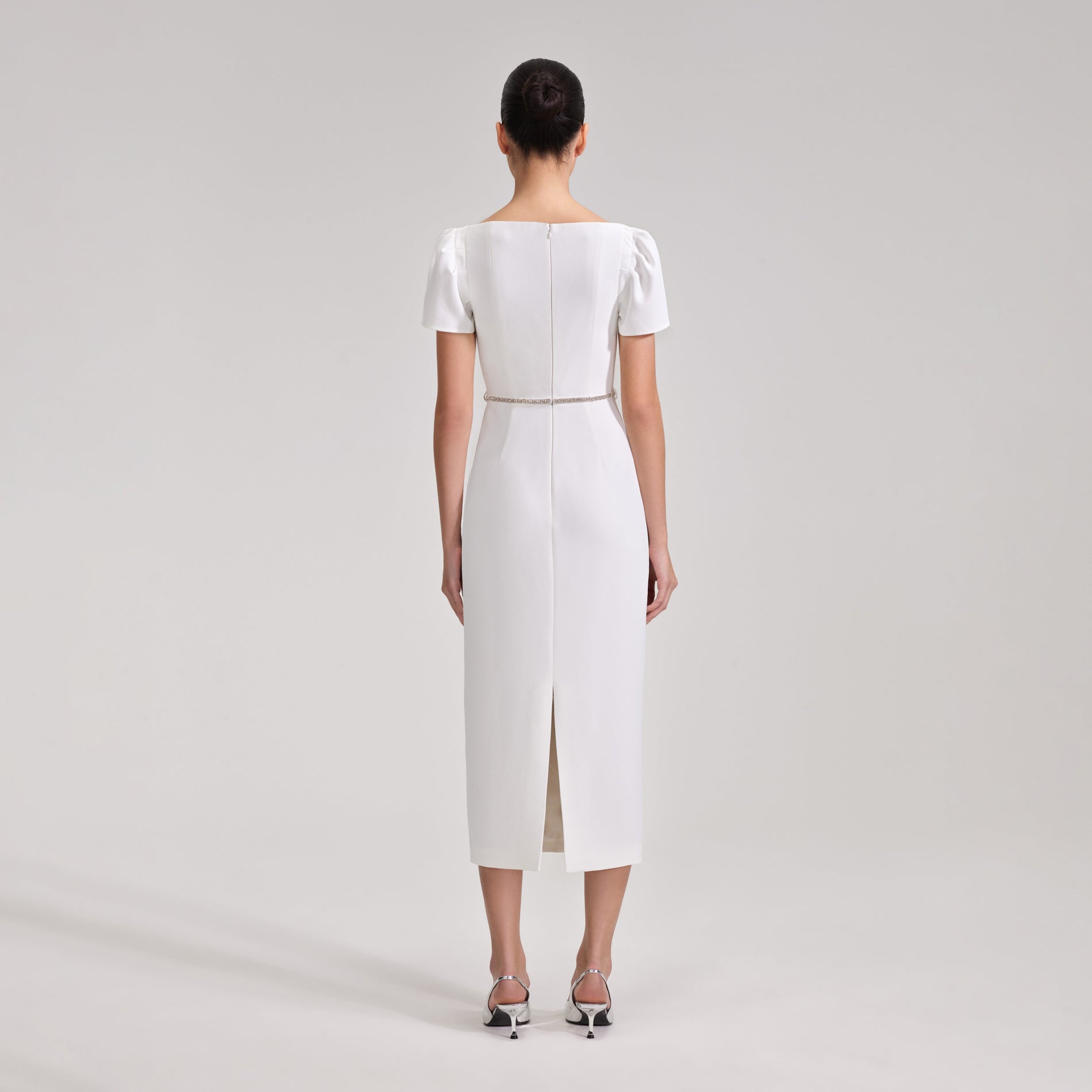 A woman wearing the White Diamante Trim Split Midi Dress