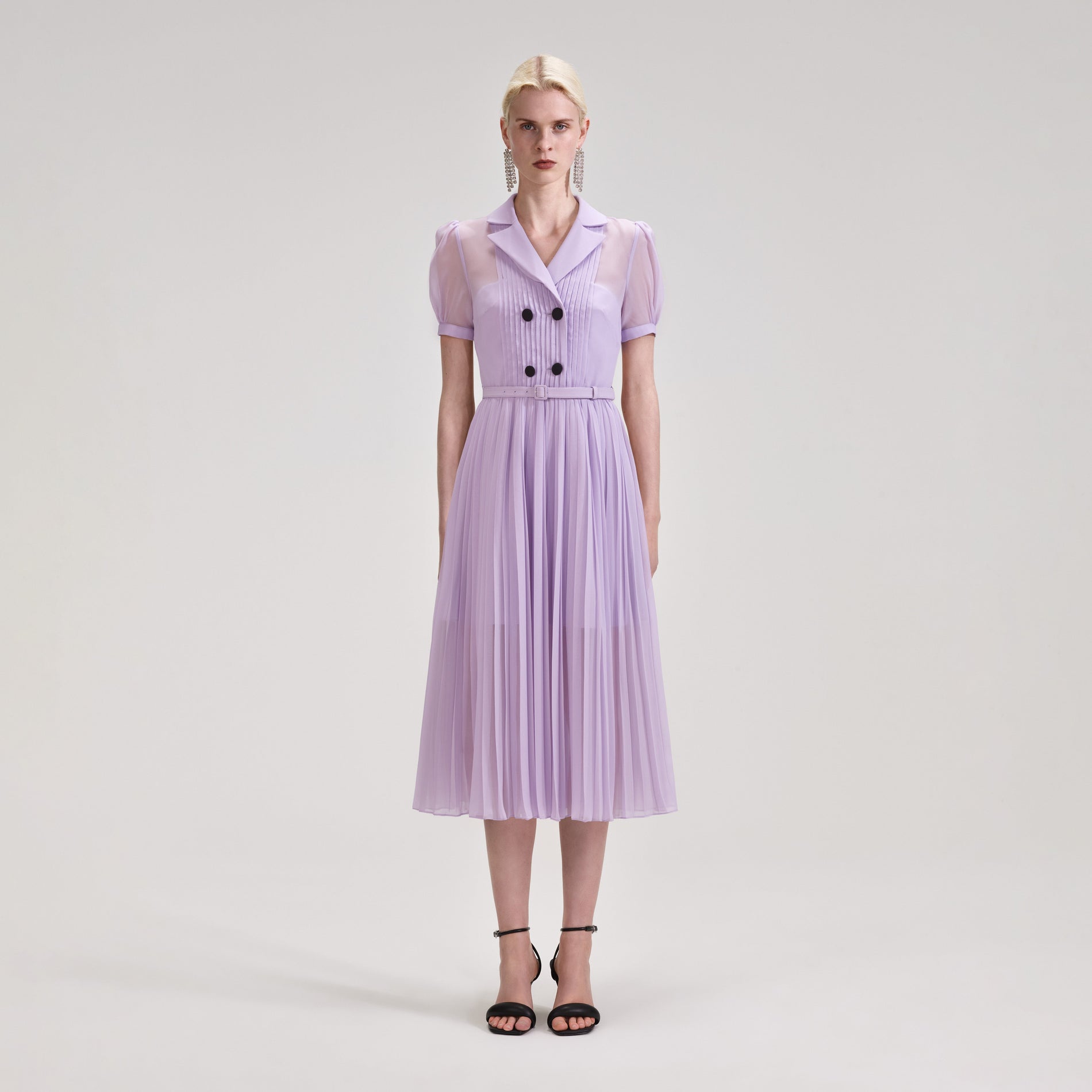 A woman wearing the Lilac Chiffon Pleated Collar Midi Dress