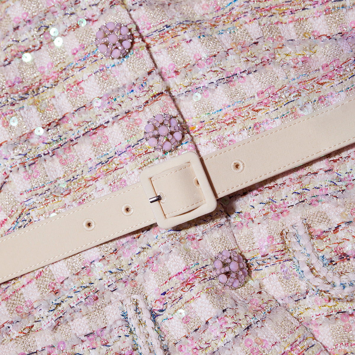 A close up of the fabric for the Pink Sequin Boucle Midi Dress