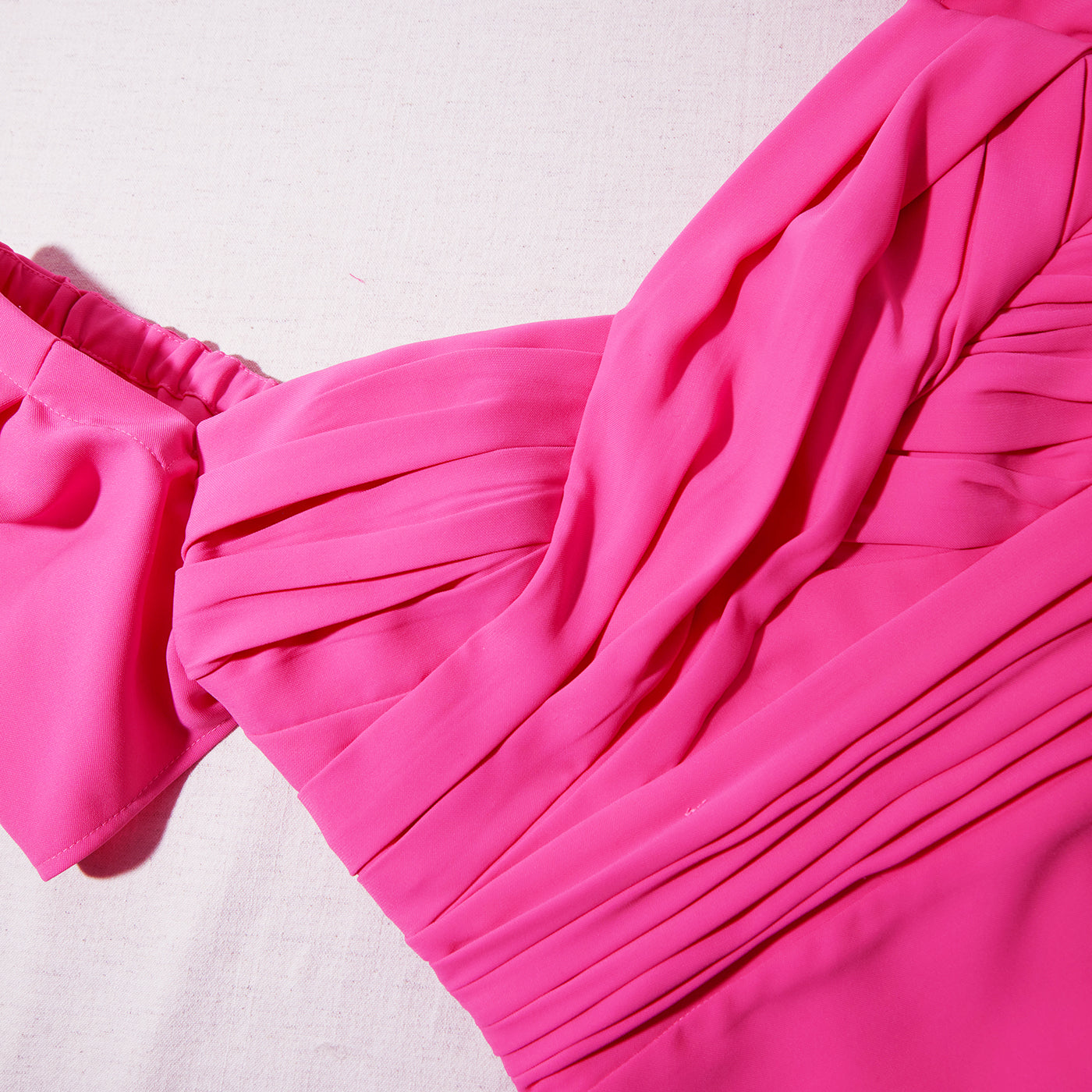 A close up of the fabric for the Bright Pink Iris Midi Dress