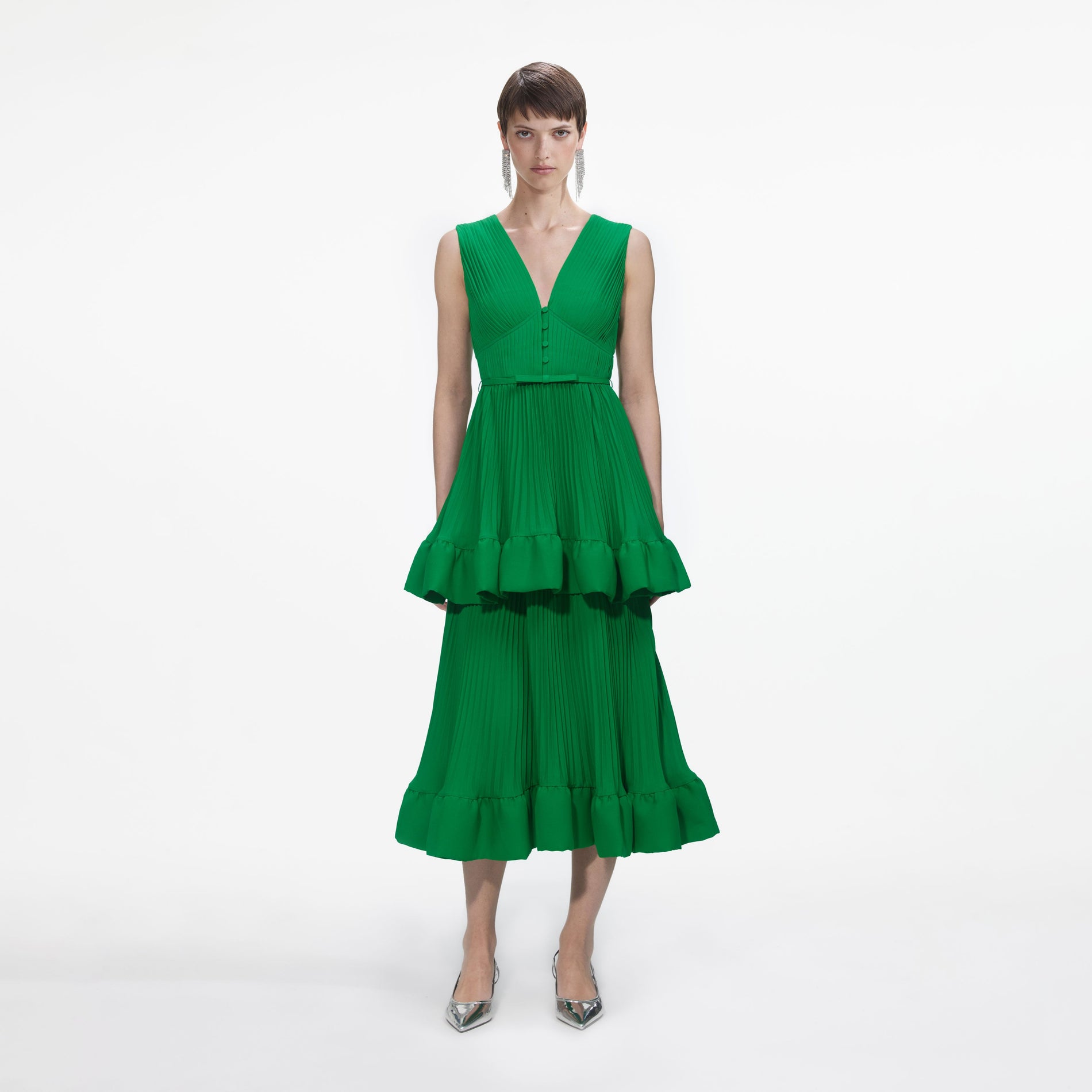 Front view of a woman wearing the Green Tiered Satin Midi Dress