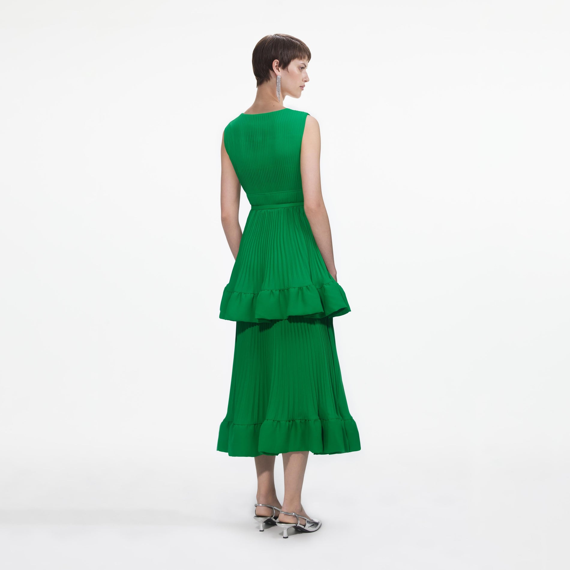 Back view of a woman wearing the White Green Tiered Satin Midi Dress