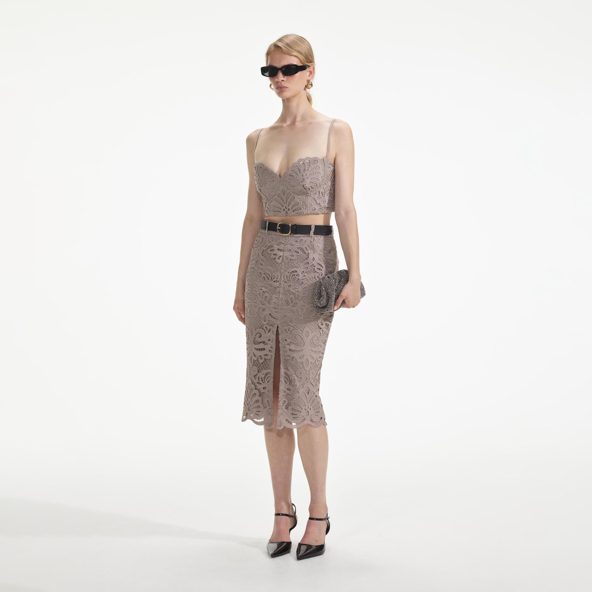 Side view of a woman wearing the Guipure Lace Midi Skirt