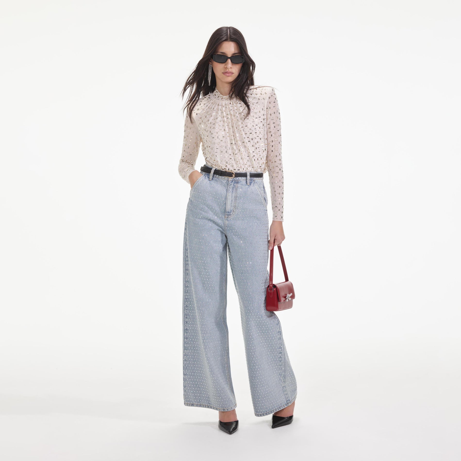 Side view of a woman wearing the Champagne Mesh Rhinestone Top