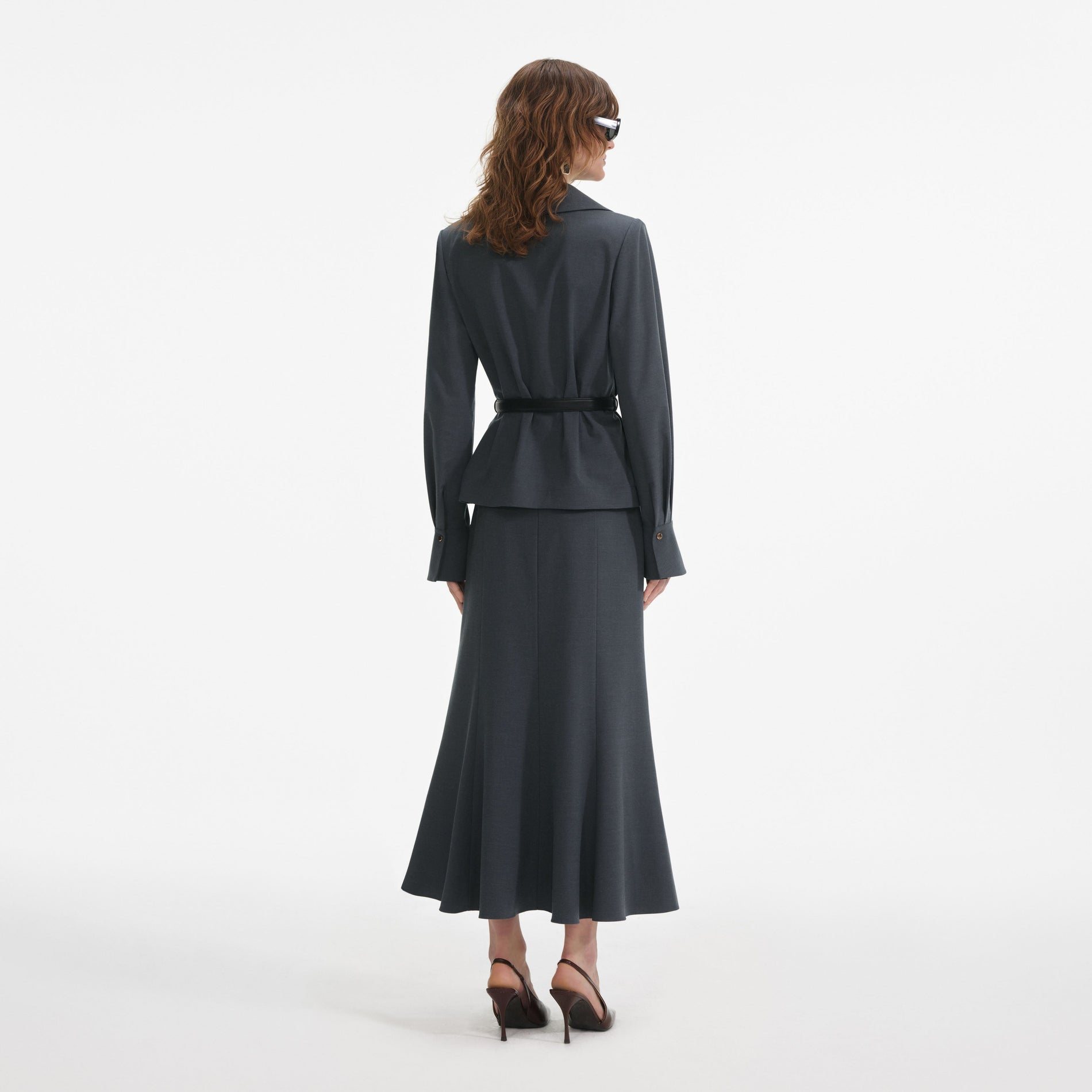 Back view of a woman wearing the Grey Twill Midi Dress