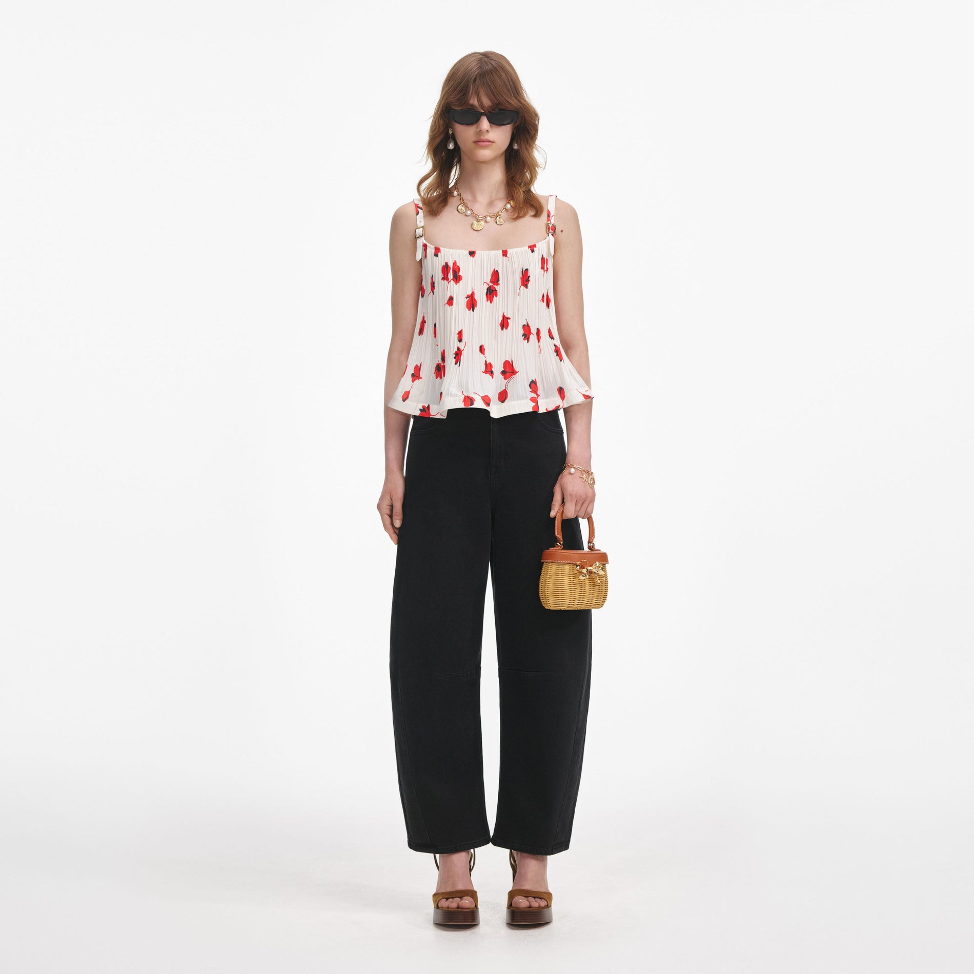 Front view of a woman wearing the White Floral Plisse Top