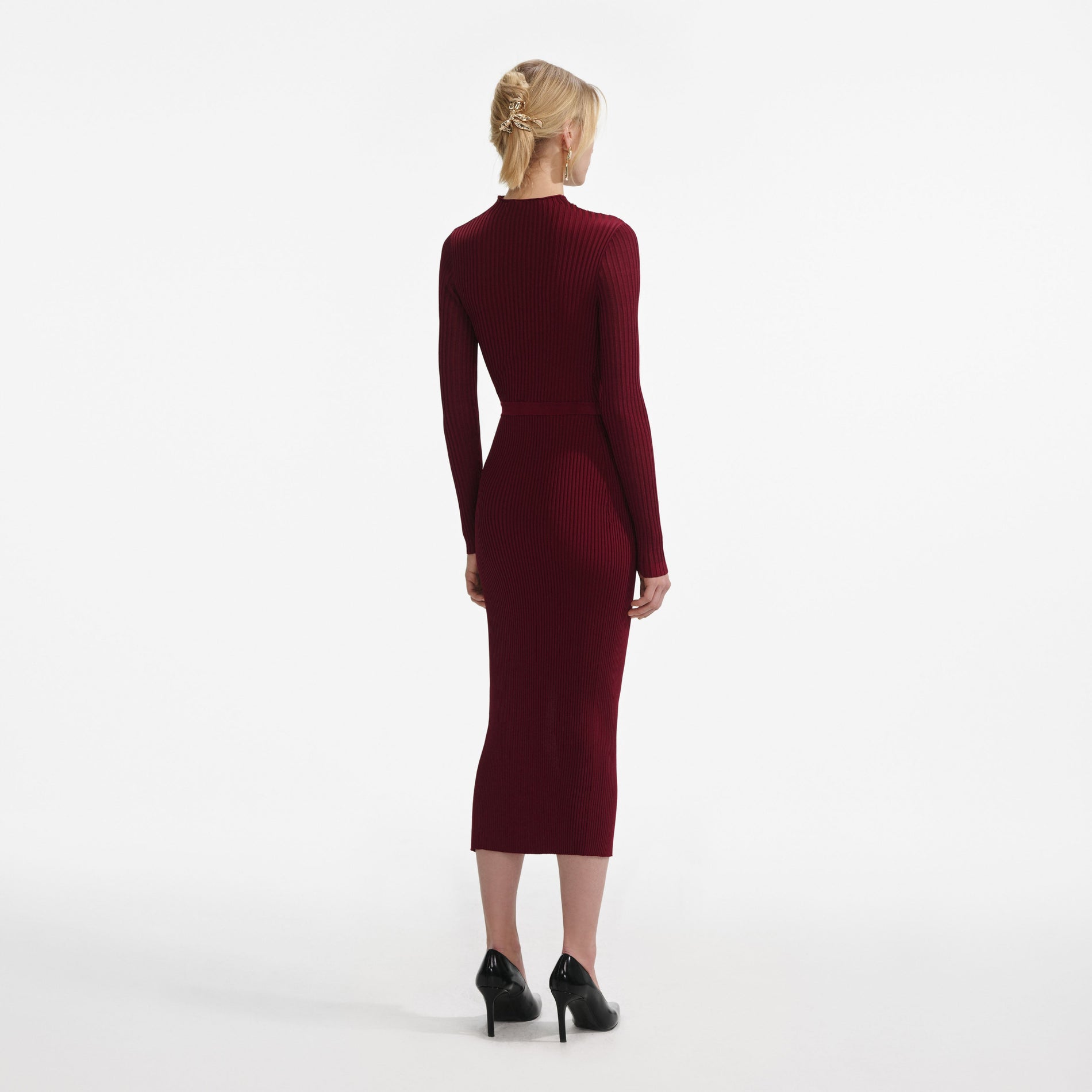 Back view of a woman wearing the Burgundy Cut Out Rib Knit Midi Dress