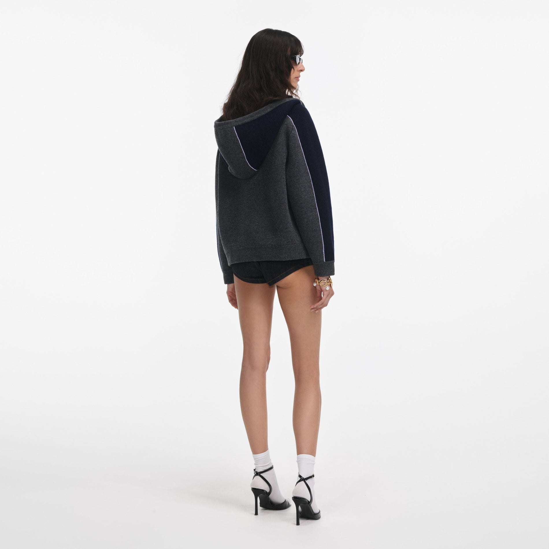 Back view of a woman wearing the Grey Ribbed Knit Hoodie