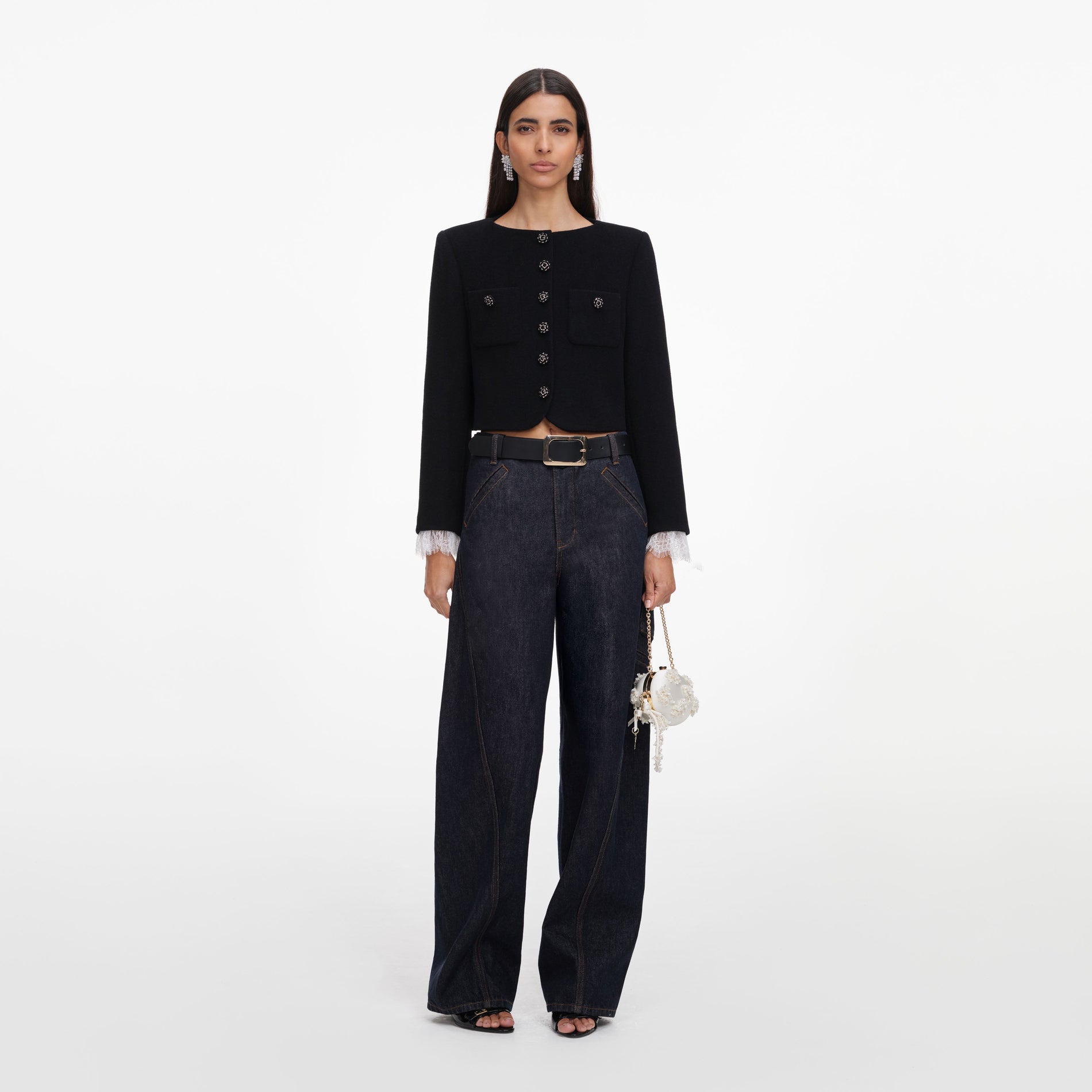 Front view of a woman wearing the Black Button Down Jacket