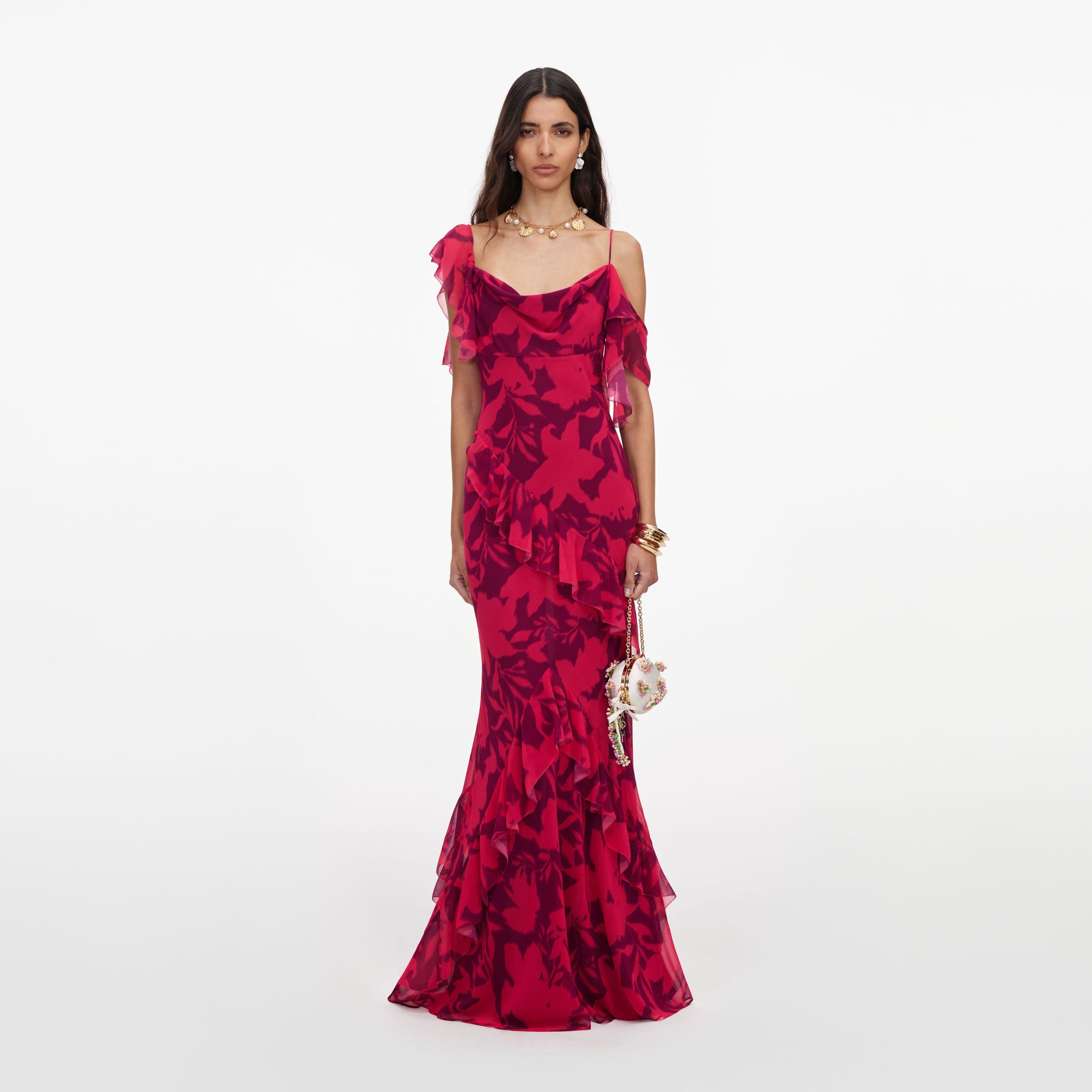 Front view of a woman wearing the Pink Floral Ruffle Maxi Dress