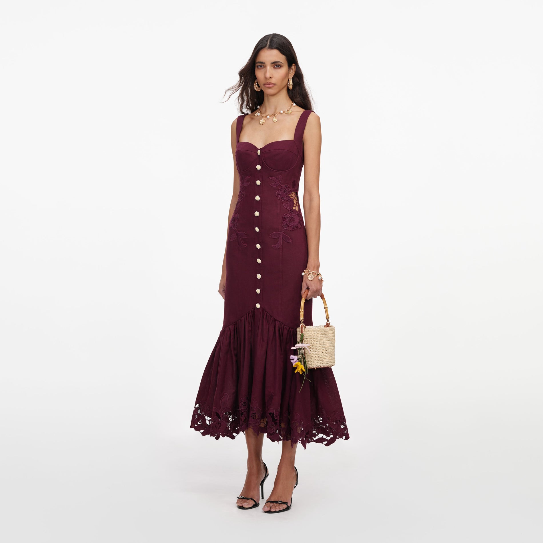 Side view of a woman wearing the Plum Linen Blend Lace Midi Dress