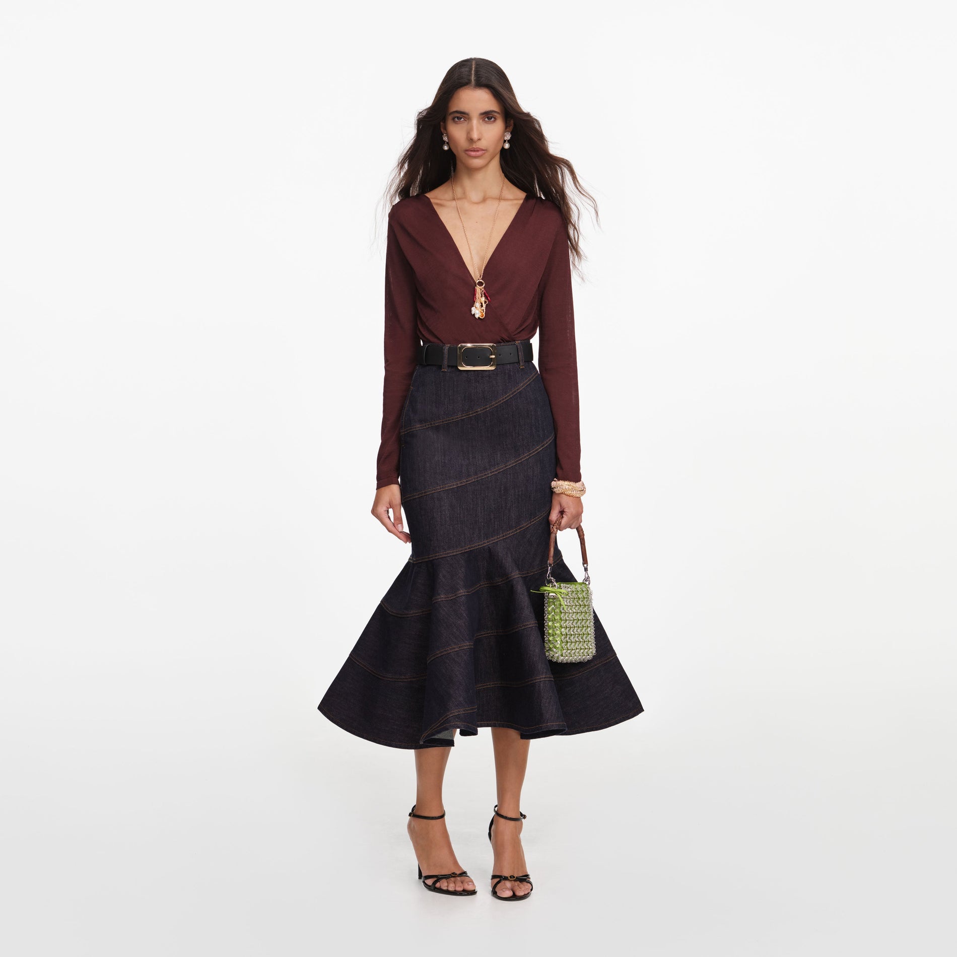 Front view of a woman wearing the Brown Viscose Knit Bodysuit