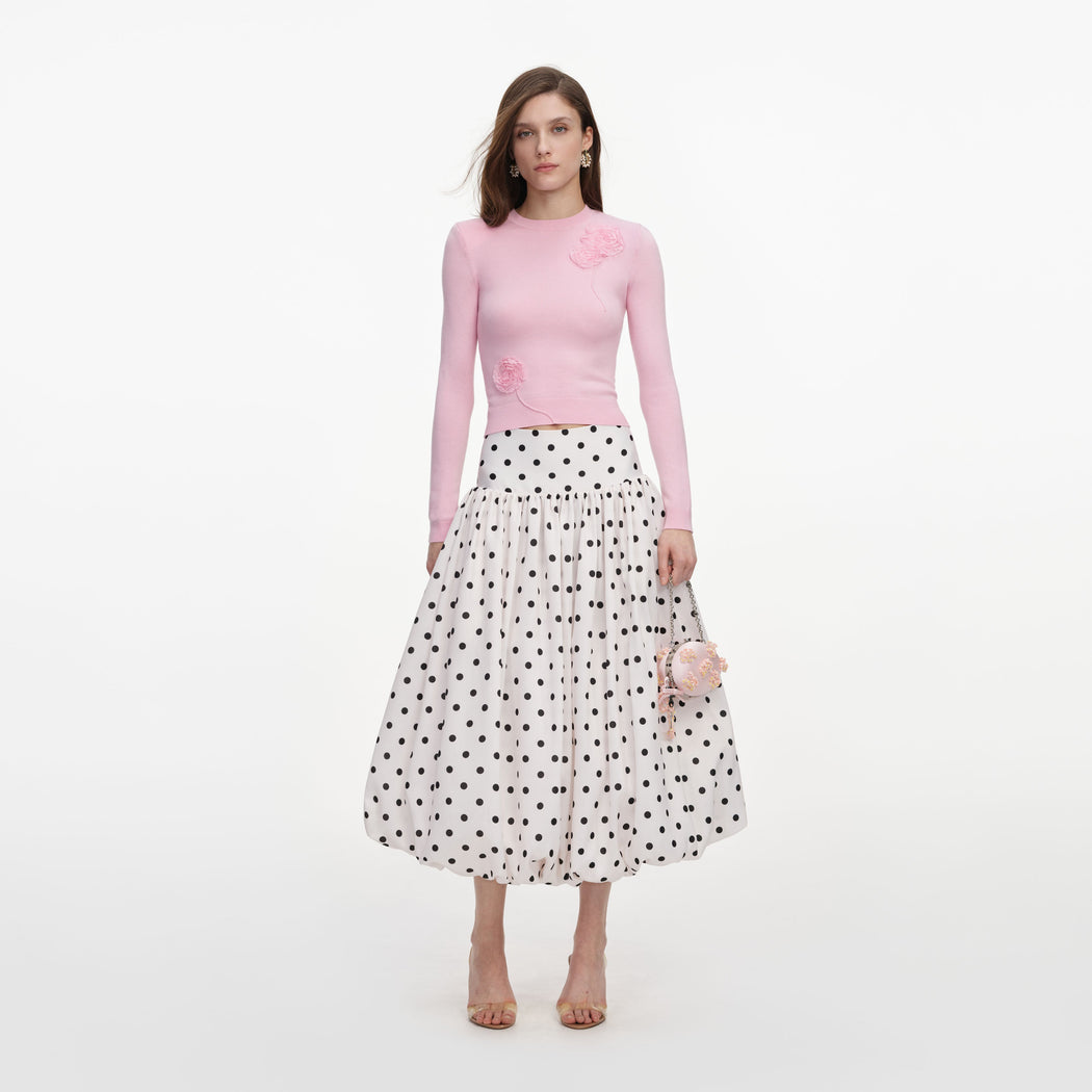 Front view of a woman wearing the Pink Flower Knit Jumper
