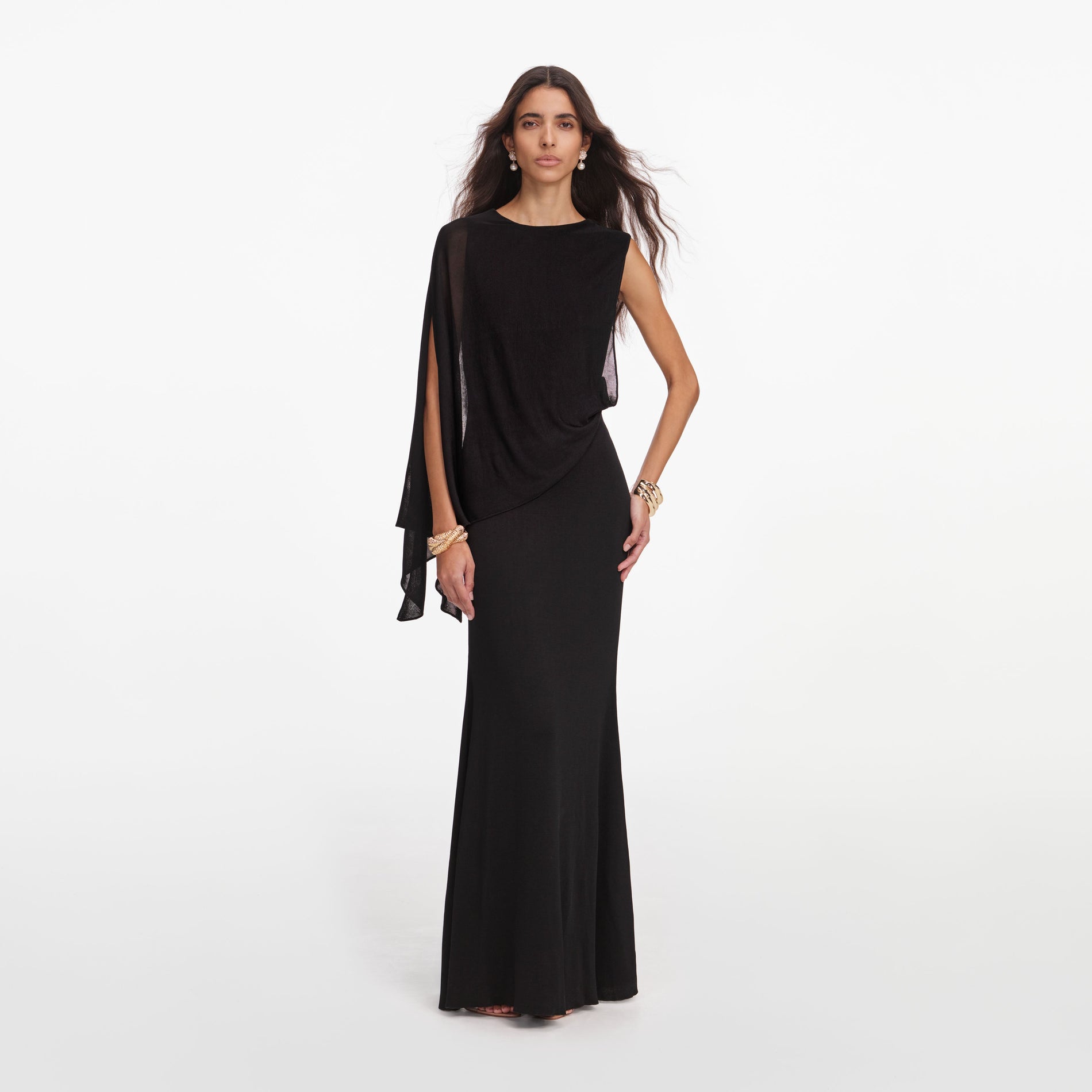 Front view of a woman wearing the Black Viscose Knit One Shoulder Maxi Dress