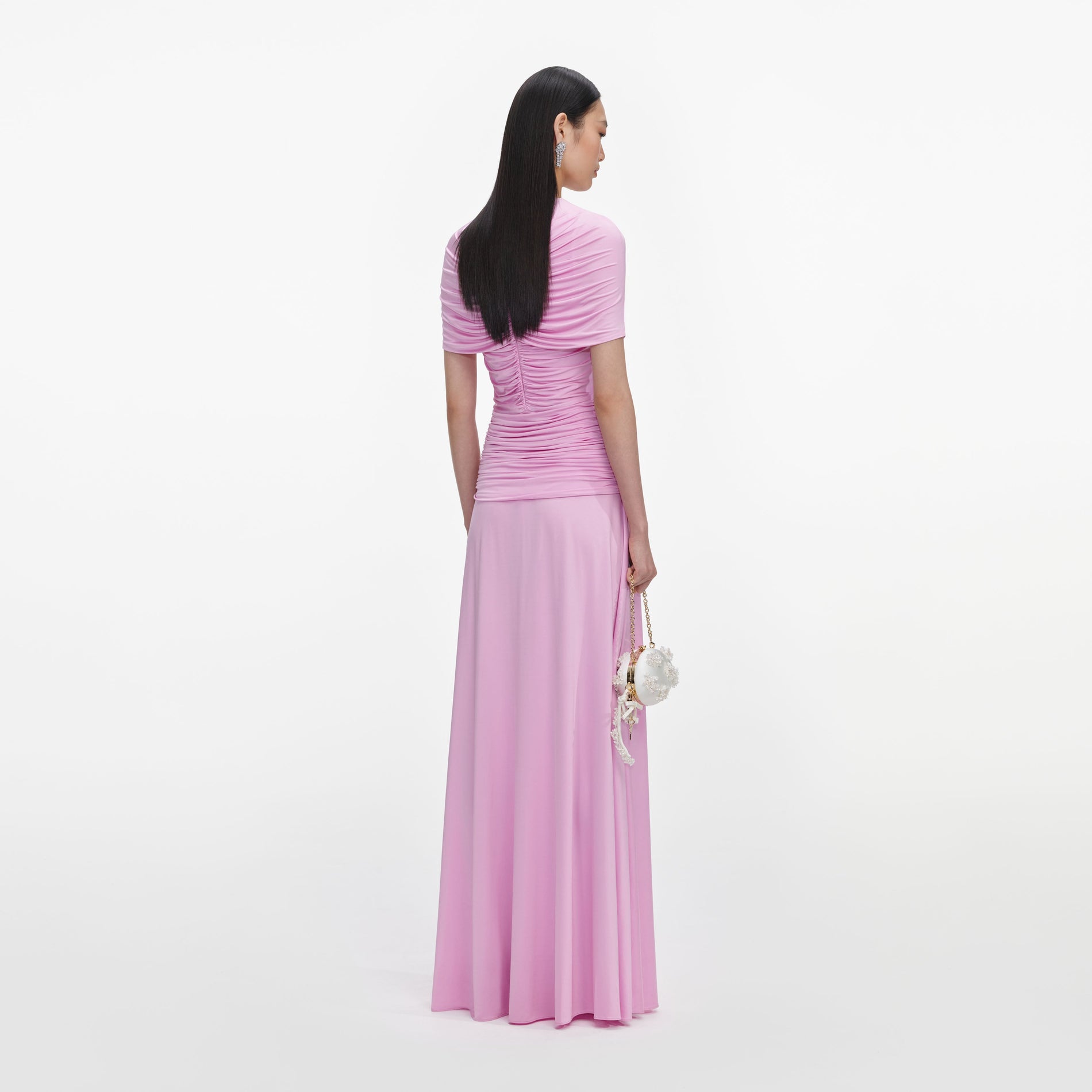Back view of a woman wearing the Pink Jersey Gathered Maxi Dress