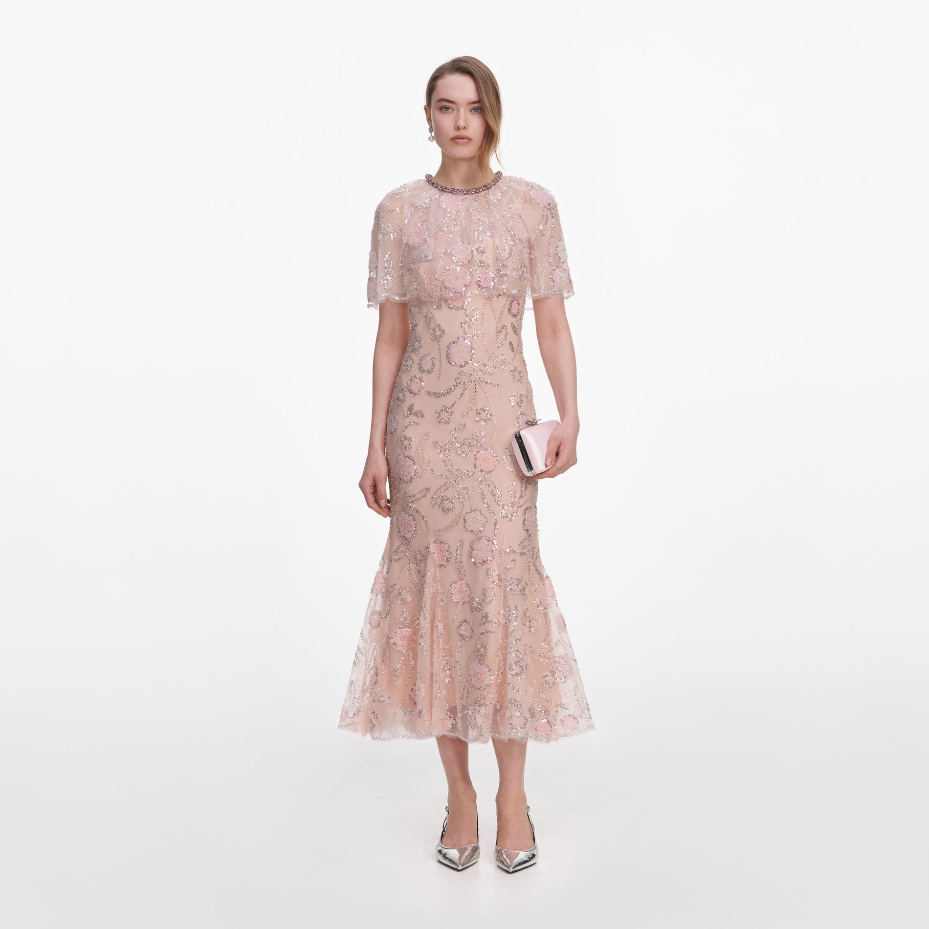 Front view of a woman wearing the Pink Embellished Cape Midi Dress