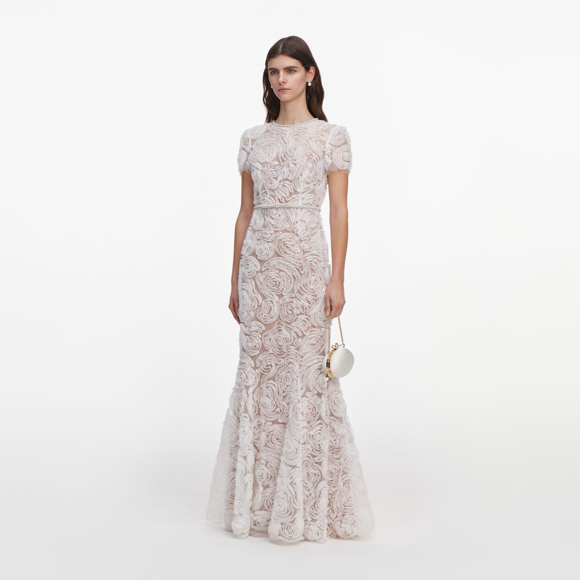 Side view of a woman wearing the White Tulle Lace Maxi Dress