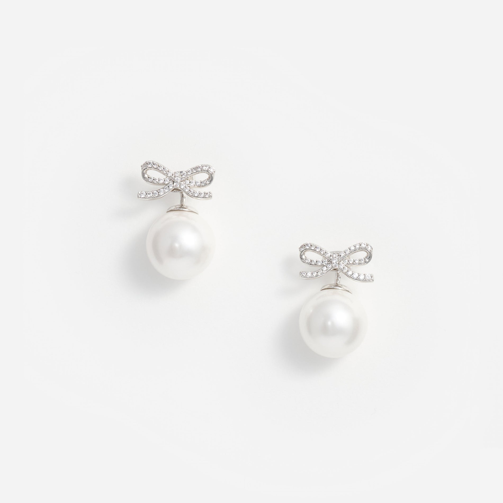 Crystal Bow Pearl Back Earrings
