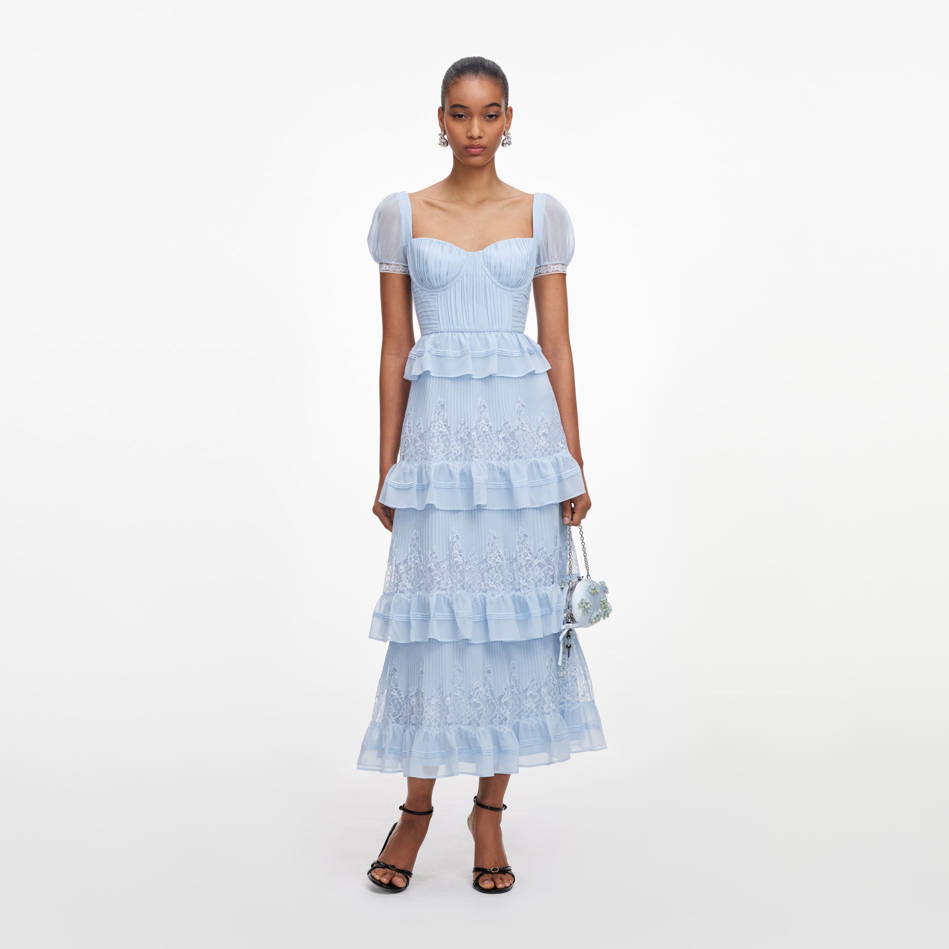 Front view of a woman wearing the Blue Chiffon Short Sleeve Midi Dress