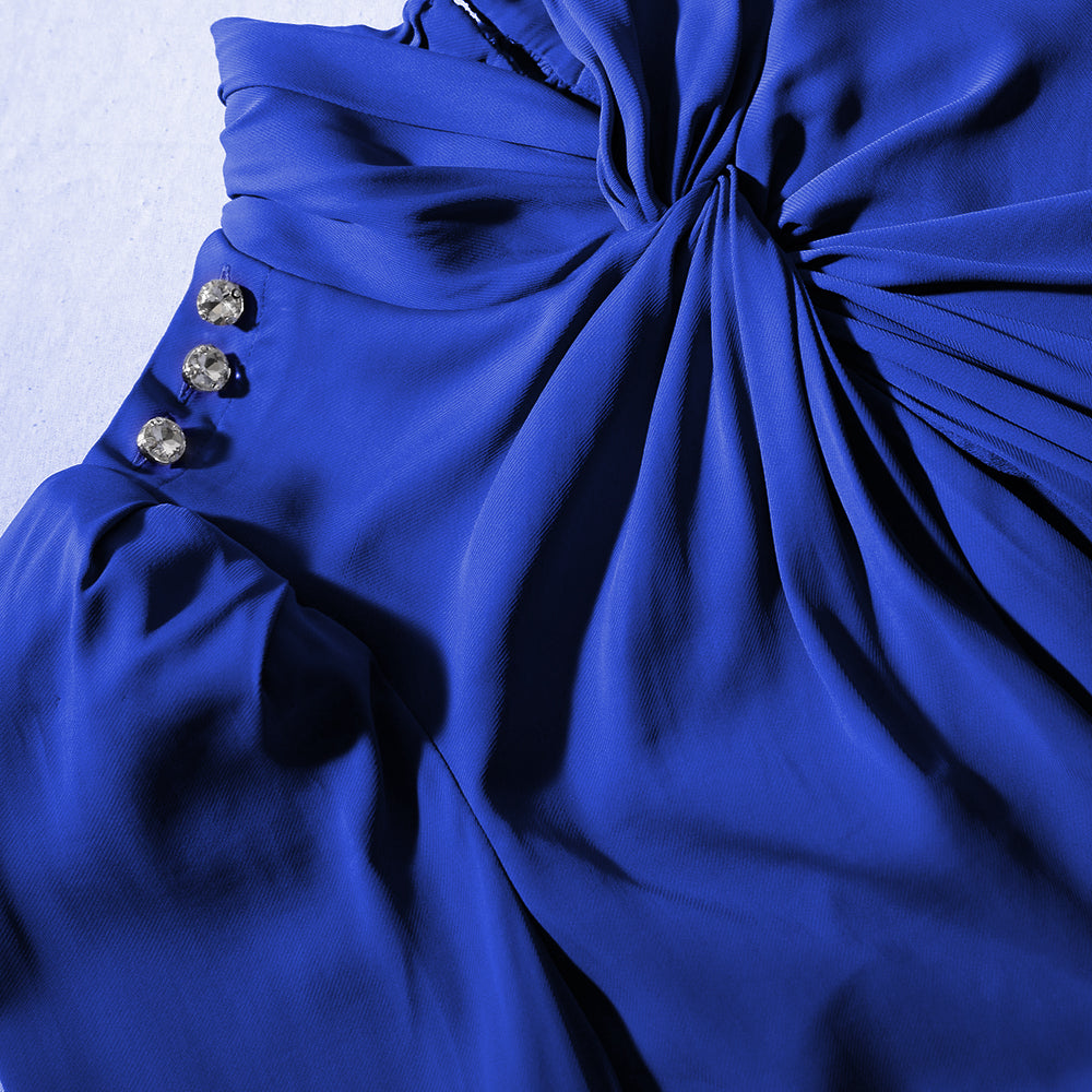 A close up of the fabric for the Blue Stretch Crepe Twisted Collar Midi Dress