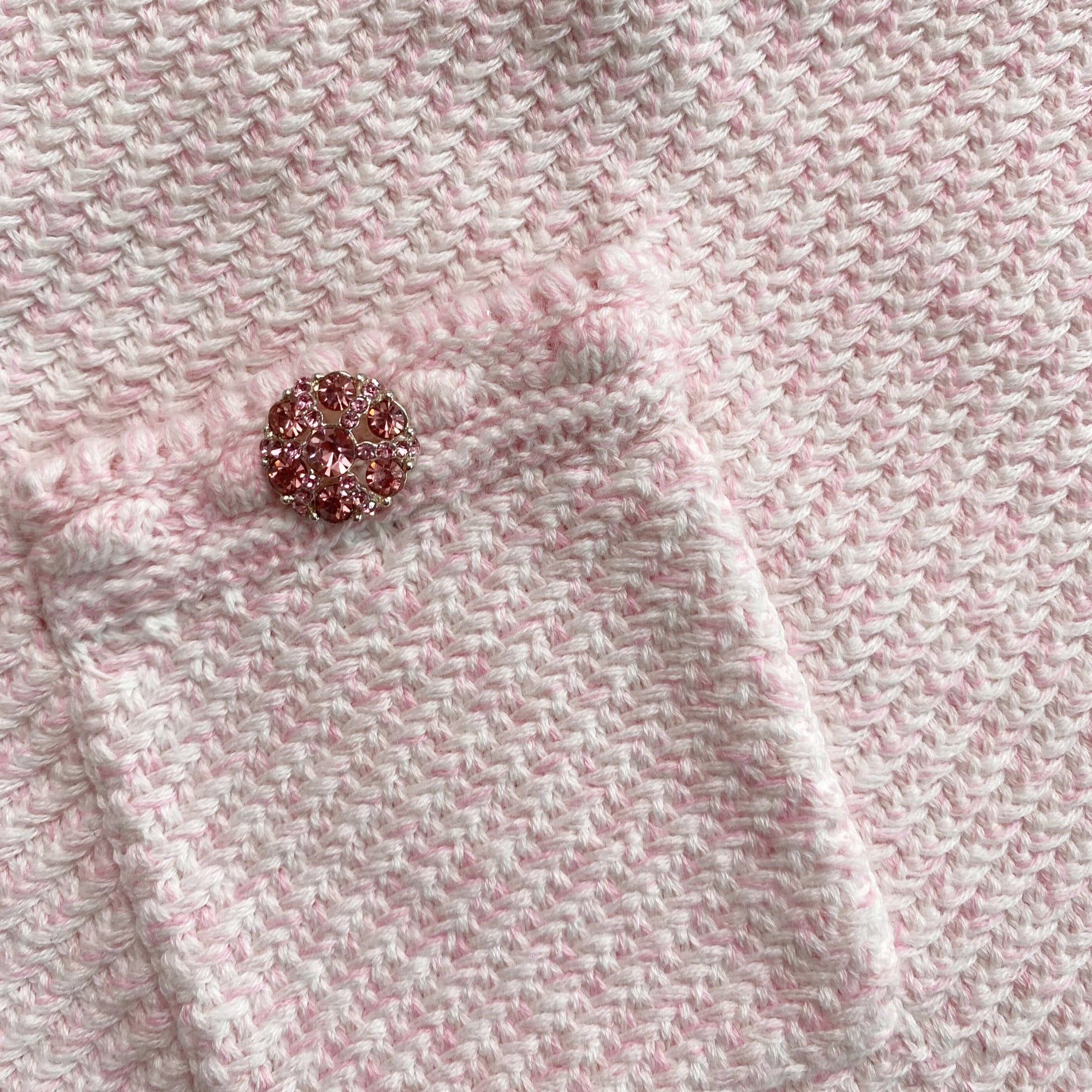 A close up of the fabric for the Pink Knit Buttoned Mini Skirt