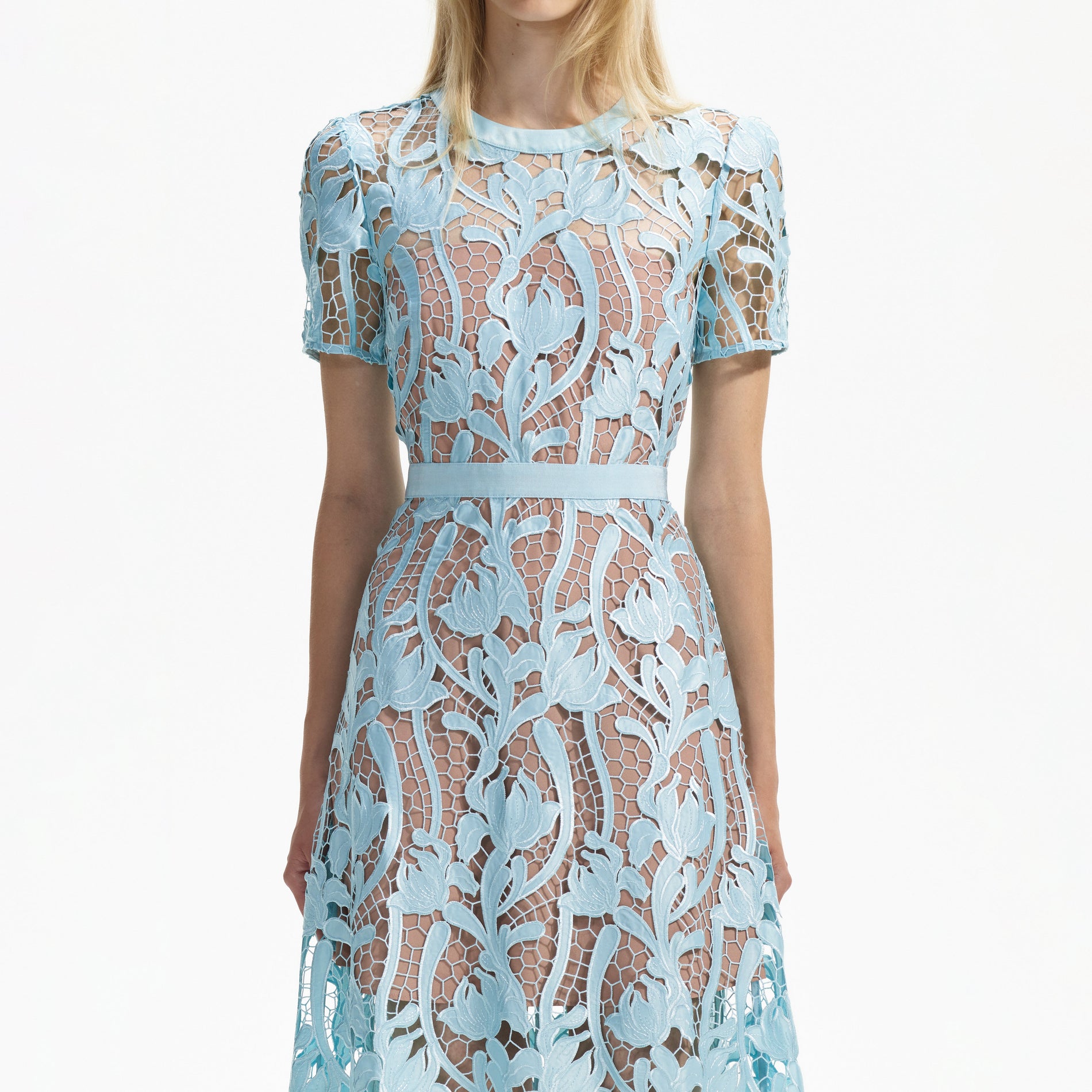 A close up of a woman wearing the Light Blue Lace Midi Dress