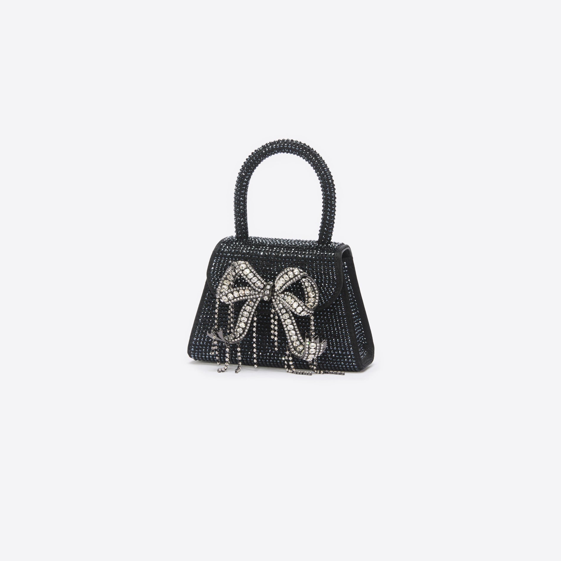Side view of a woman wearing the Black Rhinestone Embellished Micro Bow Bag