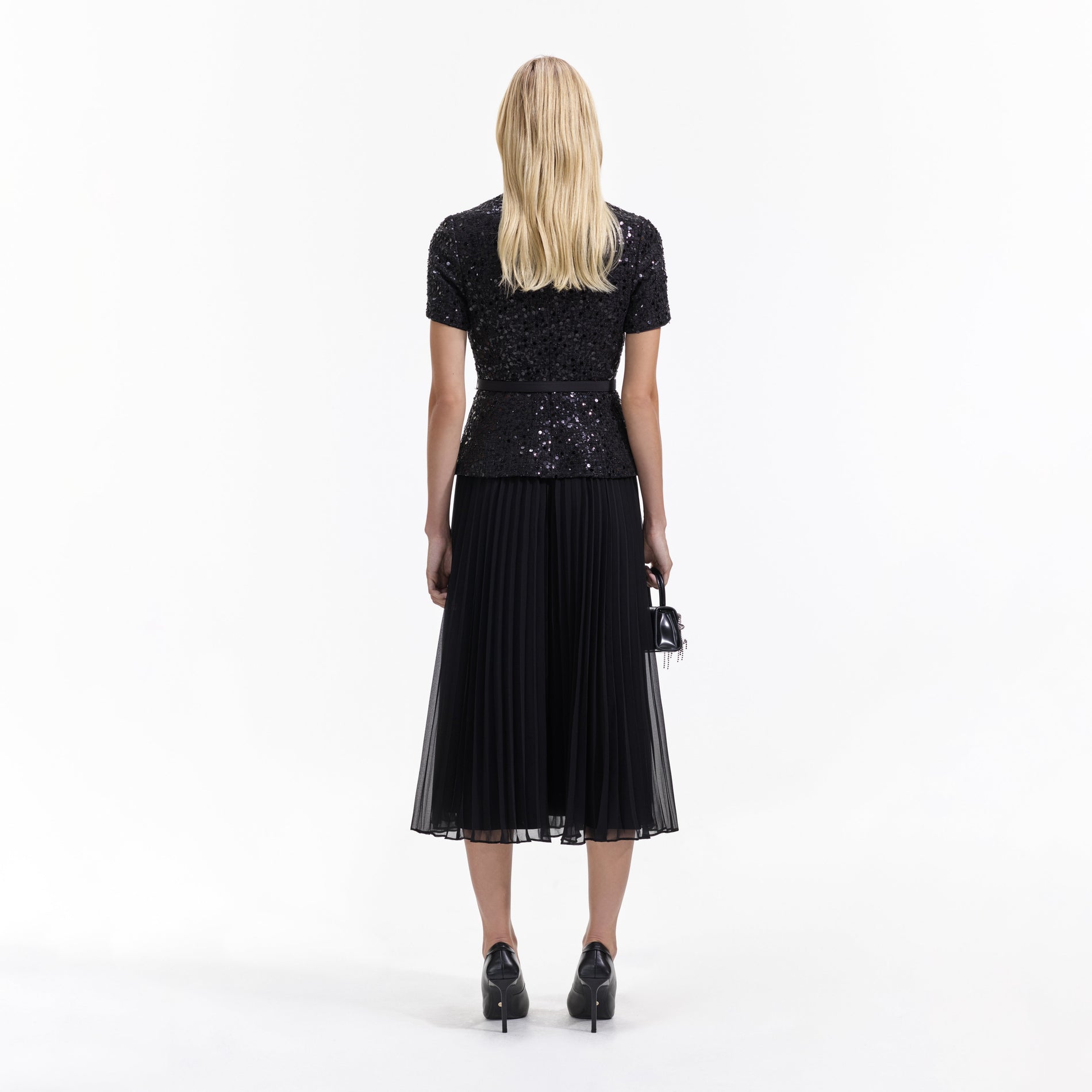 Back view of a woman wearing the Black Sequin Boucle Tailored Midi Dress