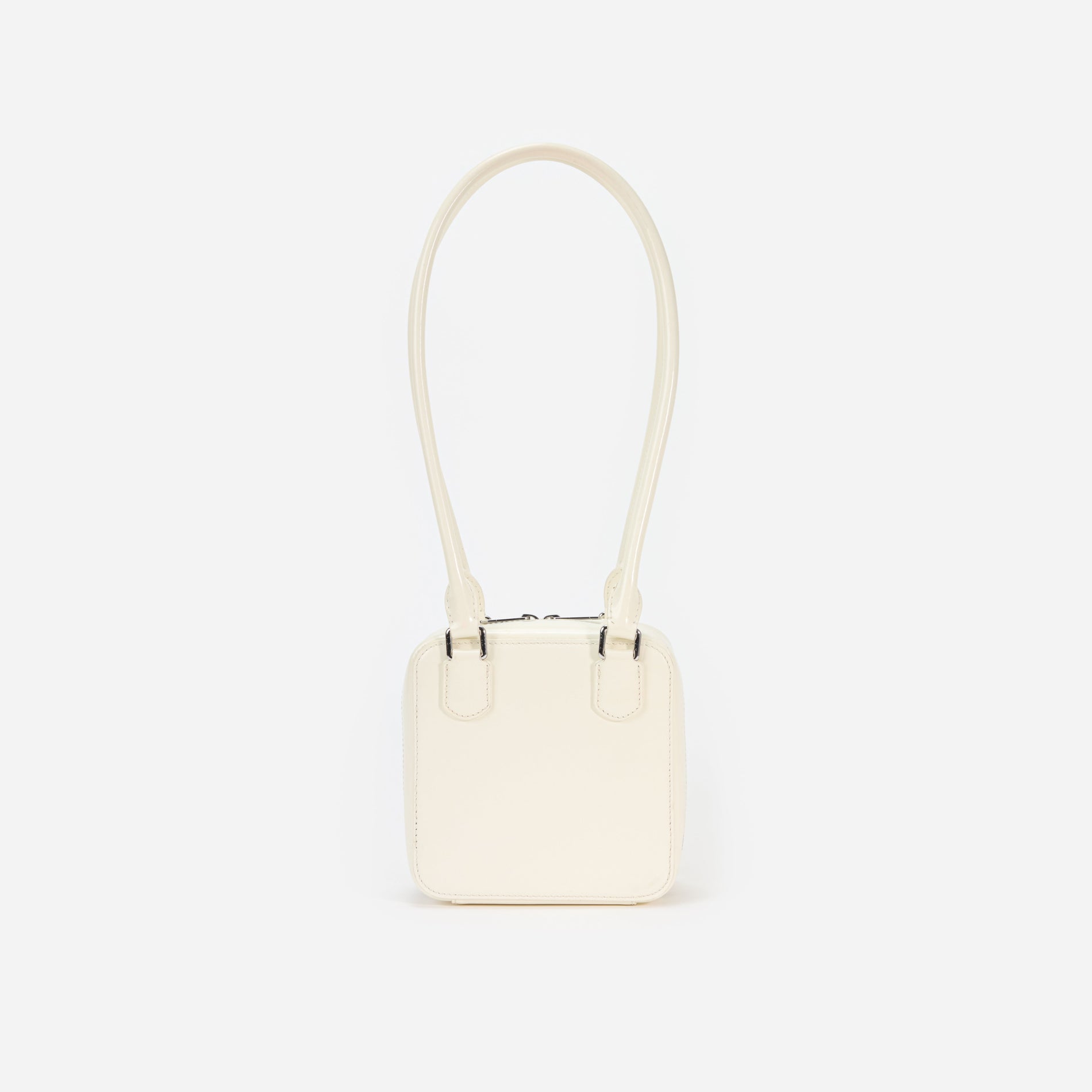 Back view of a woman wearing the Cream Leather Square Shoulder Bag