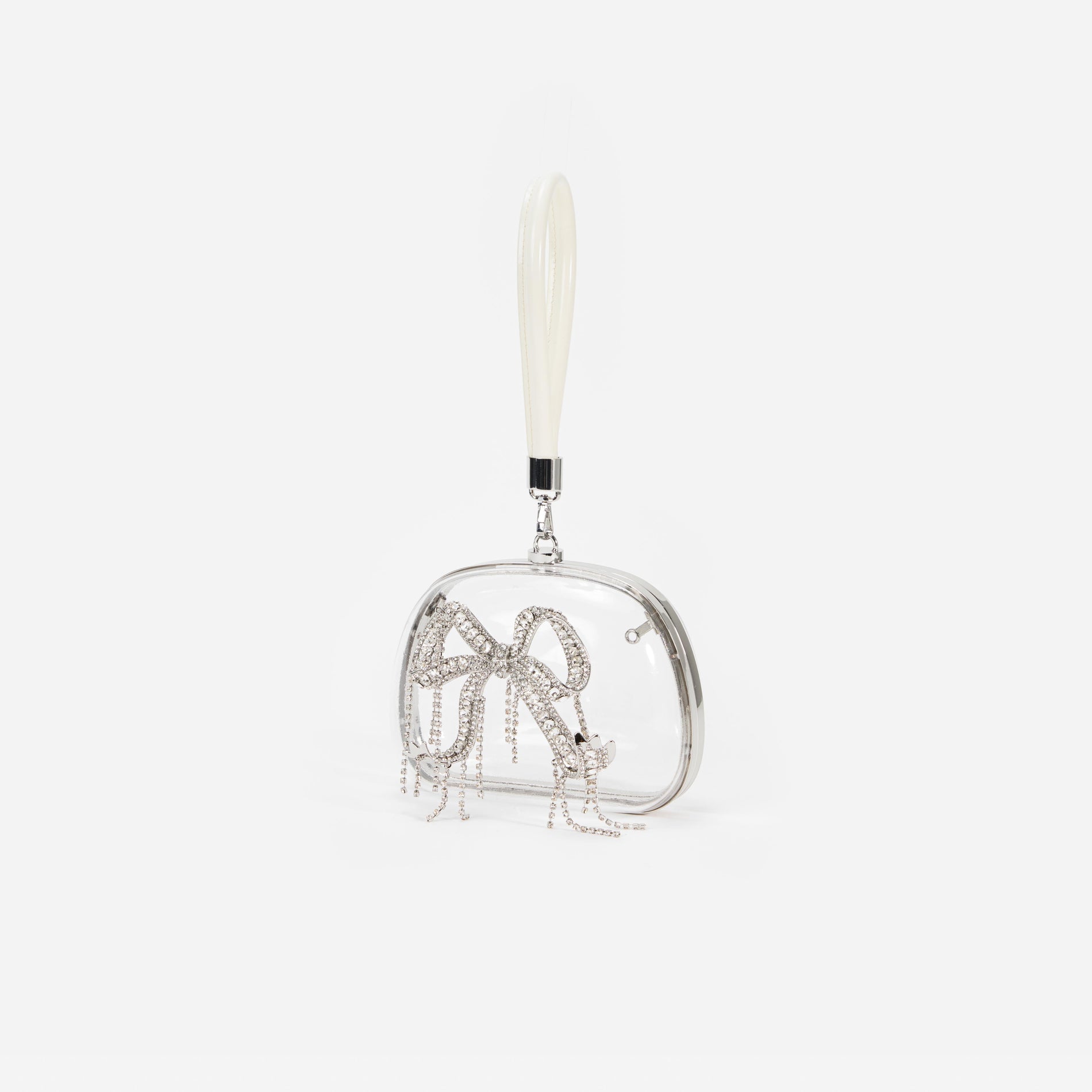 Side view of a woman wearing the Clear Top Handle Clutch Bag