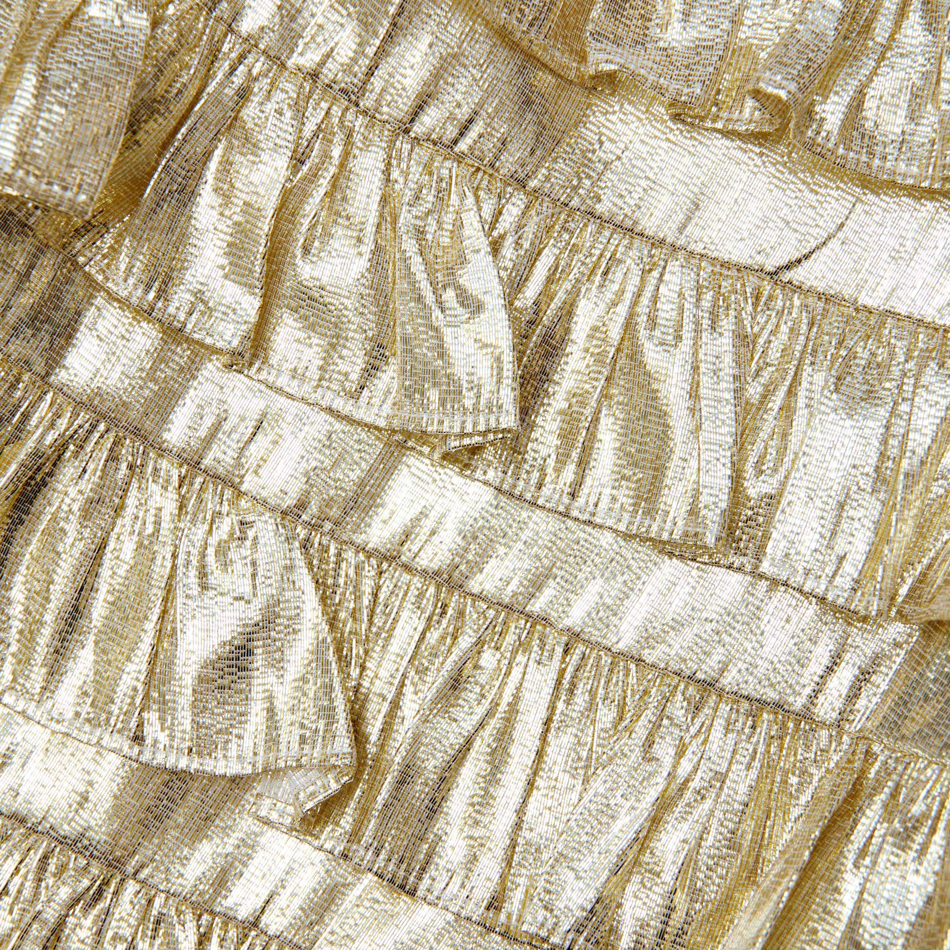 Back view of a woman wearing the Gold Metallic Frill Dress