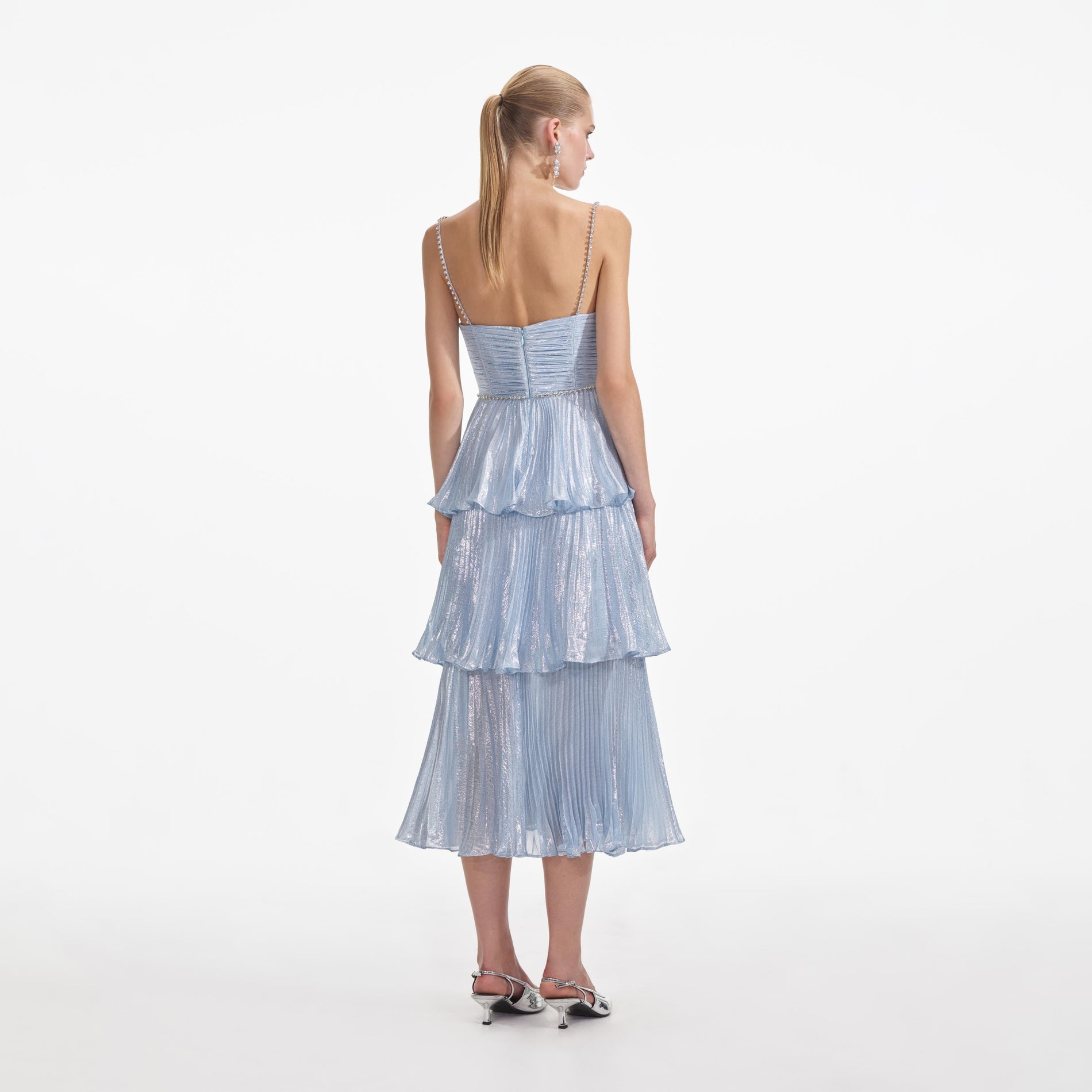 Back view of a woman wearing the Blue Metallic Tiered Midi Dress