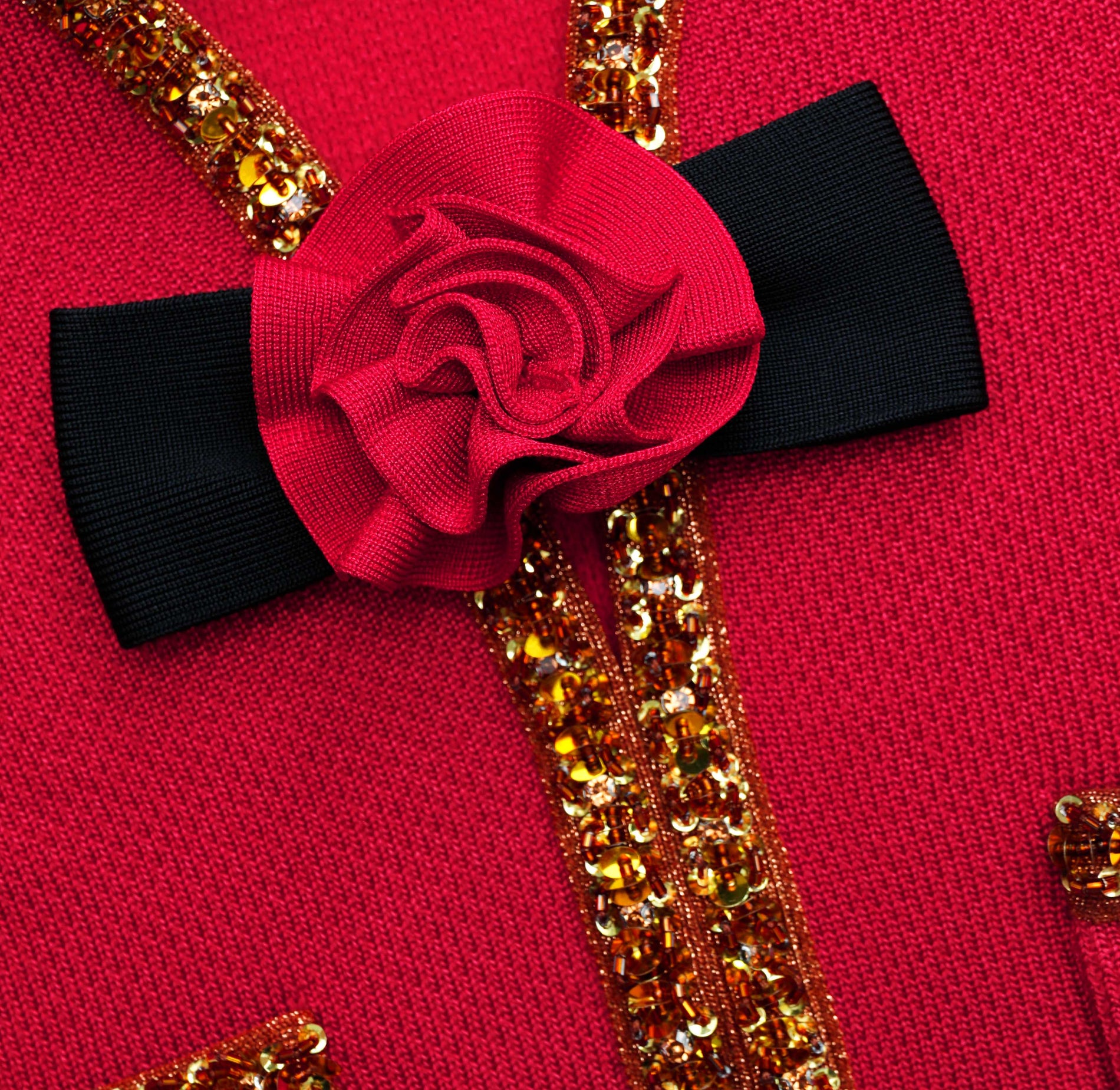 A close up of the fabric for the Red Textured Knit Corsage Midi Skirt