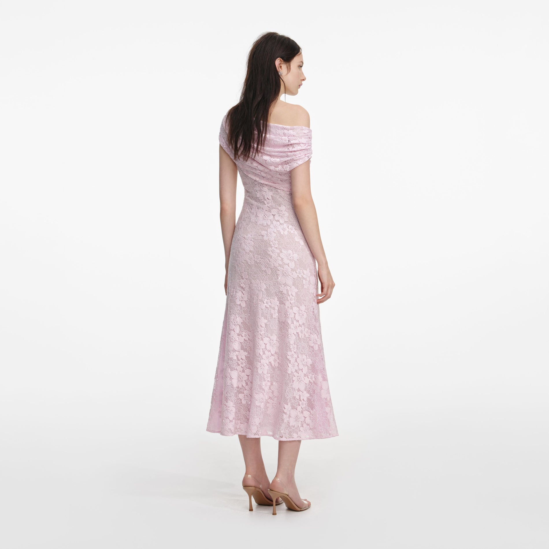 Back view of a woman wearing the Pink Rhinestone Lace Midi Dress