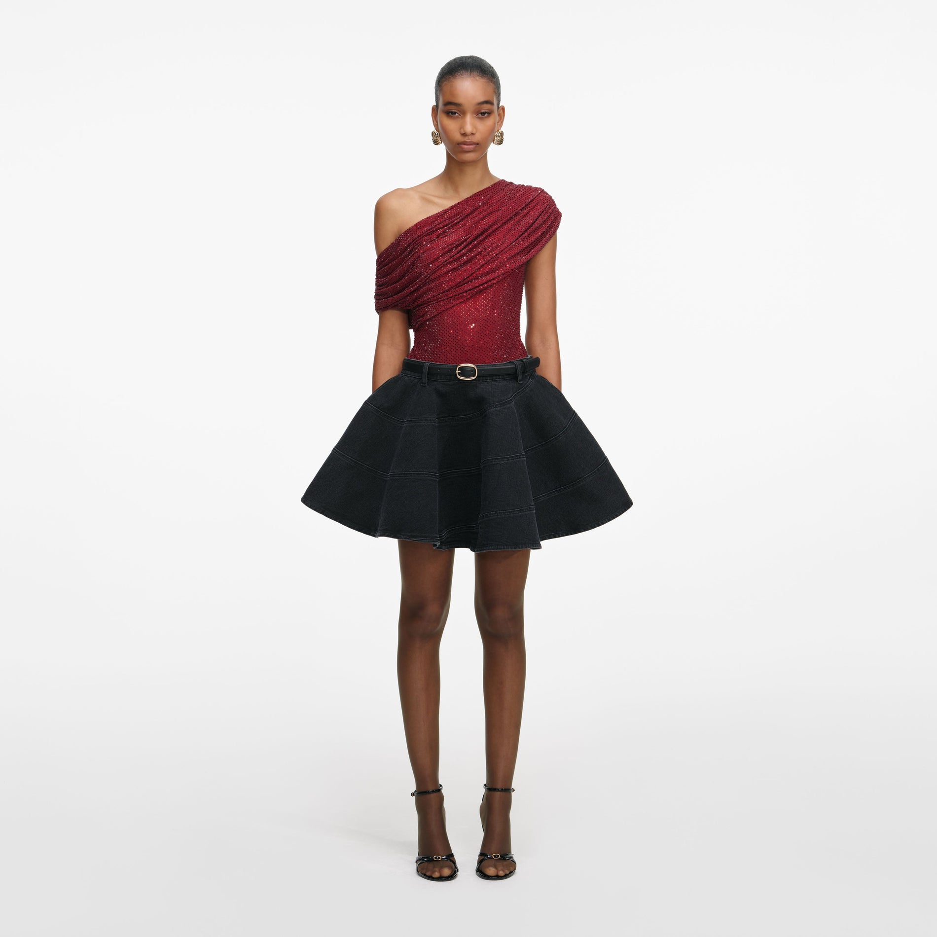 Front view of a woman wearing the Burgundy Rhinestone Drape Top