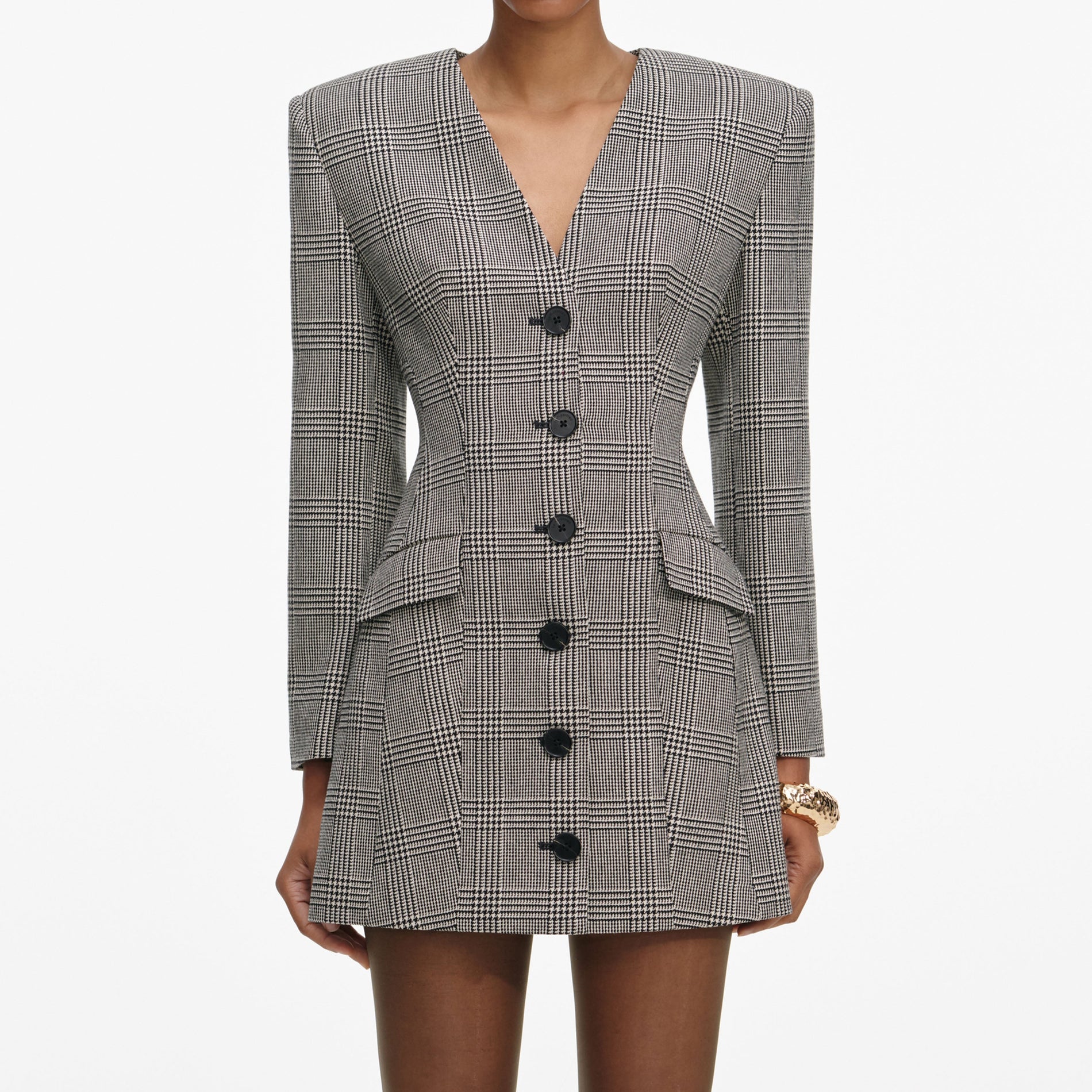 A close up of a woman wearing the Check Blazer Mini Dress