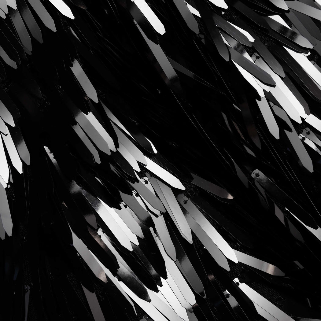 A close up of the fabric for the Black Sequin Midi Skirt